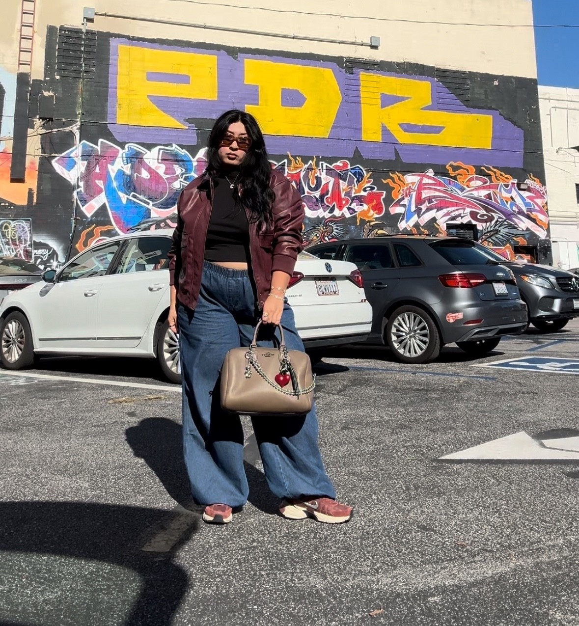 Wine is my favorite 😉 I’m wearing a large in the jacket and the fur collar can be removed 
The bag is the Coach Rowan in large 

#LTKMidsize #LTKPlusSize #LTKootd