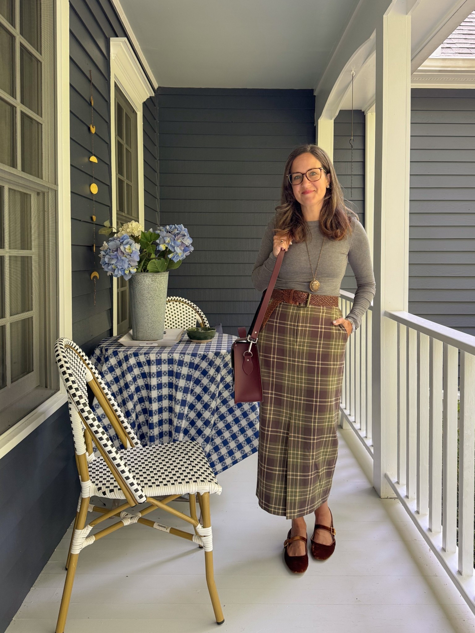 Styling a plaid midi skirt for autumn~ simple gray top, belt, fuzzy Mary Jane flats 🥿 
Fall outfit

#LTKOver40 #LTKSeasonal #LTKStyleTip
