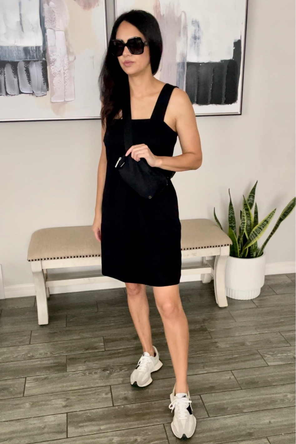 Women’s black casual dress 
Travel dress 
Travel outfit 
Sneakers new balance 327 

#LTKFind #LTKstyletip #LTKtravel