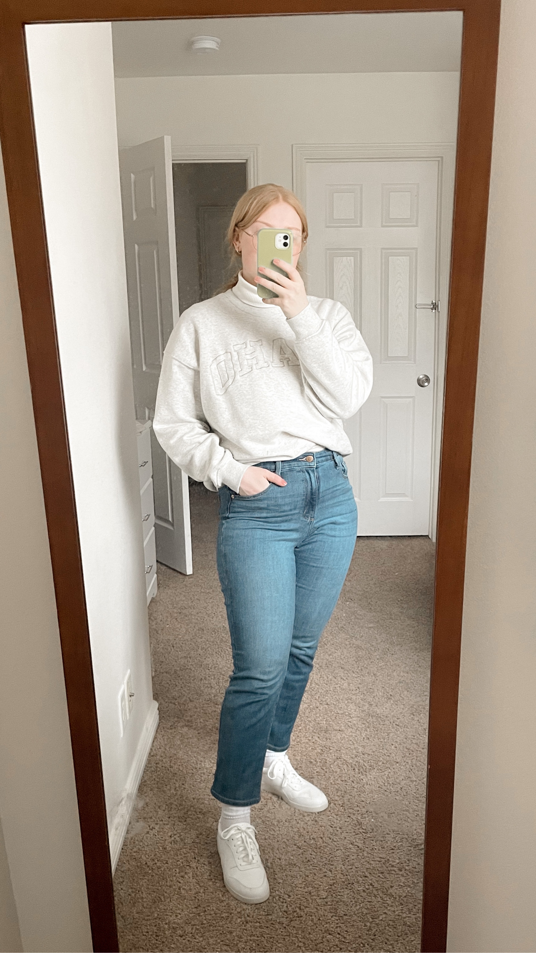 large in sweatshirt 
medium in turtleneck 
8 in jeans 

#LTKstyletip