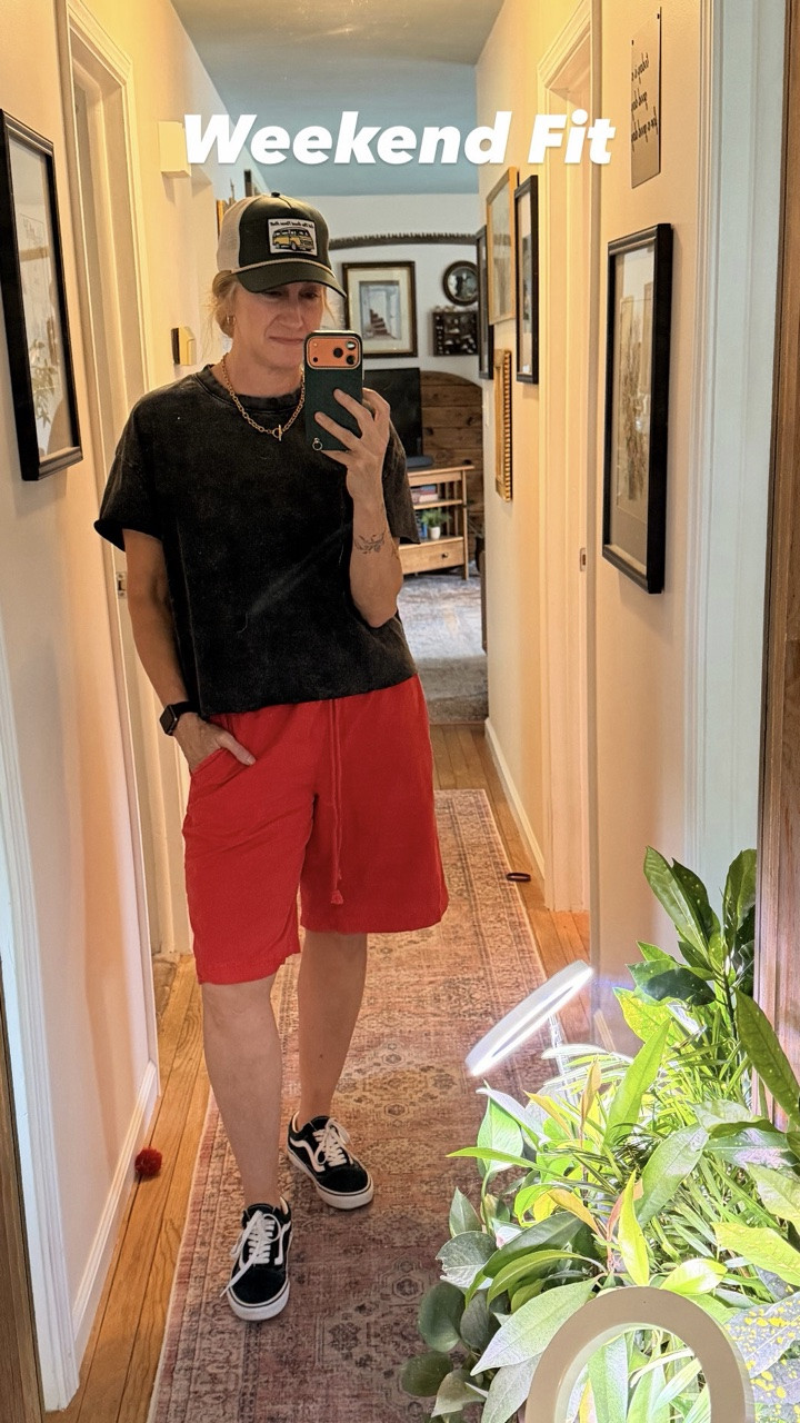 Yesterday was dead ass lazy & I leaned all the way into it. 😂

No makeup.
No “doing” the hair.
Just an oversized Amazon tee with “It Is What It Is” across the back… honestly my life slogan lately.

Threw it on with red boardshorts, green Vans, my “Let The Good Times Roll” hat & RayBans because the sun finally decided to show up during the LAST 4 HOURS of Memorial Day weekend.

WTF even was that weather? ☀️🌧️
Mother Nature was in a mood this weekend… although my flowers are living their best lives from all the rain so I guess somebody benefited.

Also… shoutout to the hubs for hanging all my hats in my dressing room (formerly known as Matt’s room… sorry bud 😂). I was FULLY planning on doing that project myself until my husband started asking weird responsible adult questions like, “Do you have a tape measure?” Sir… what do you mean I need a tape measure? 😑😂

This whole outfit felt very “retired camp counselor who gave up.” 😂

LTK is linked if anybody else is dressing for emotional support & comfort lately.

#TeacherStyle #MidlifeFashion #CasualStyle #LTKFind #weekendfit

#LTKootd #LTKSeasonal #LTKgrwm