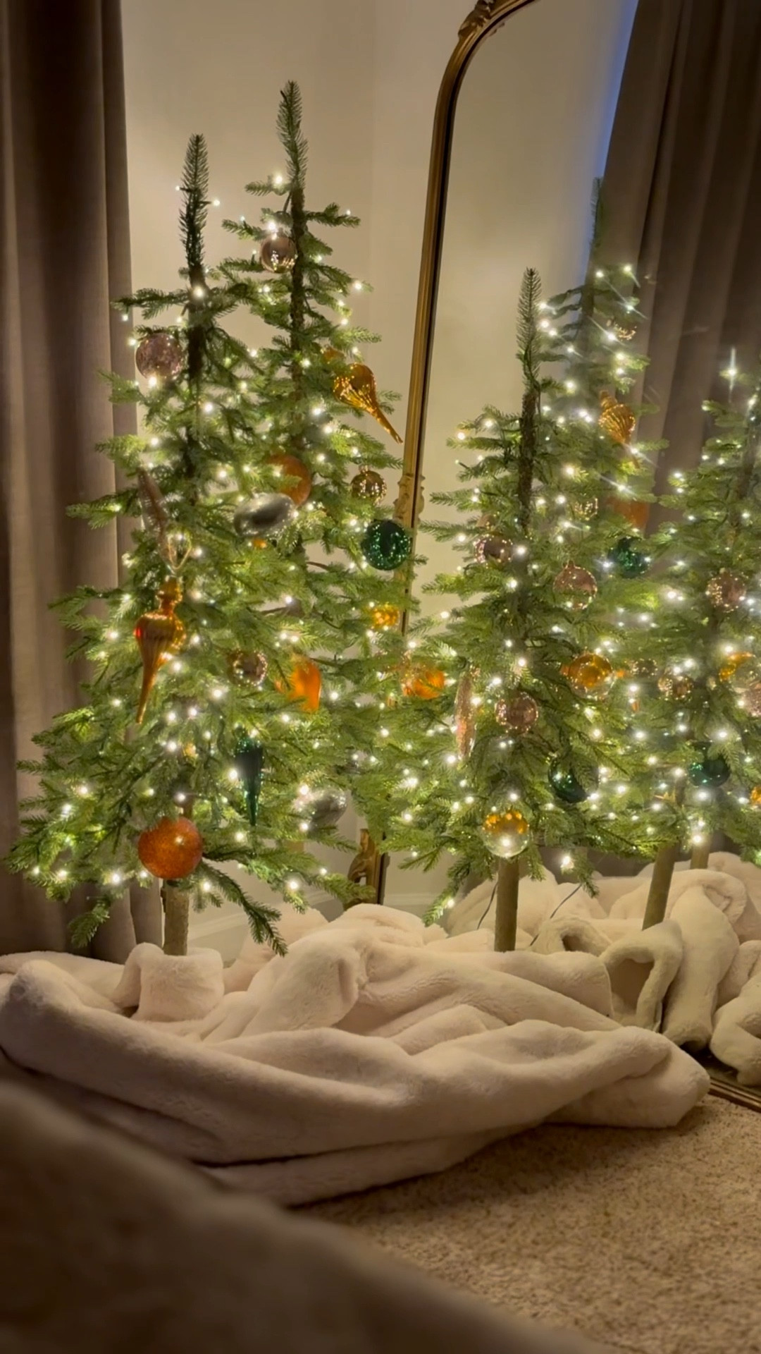 Thank you, @kingofchristmas for making my guest bedroom so cozy!  #ad  This set of twinkling accent trees are beautiful and come in a flocked version as well. Check out those beautiful ornaments and ribbon too!  Archie couldn’t get enough either.  🐶 

#kingofchristmas 

#LTKHoliday #LTKSaleAlert #LTKHome