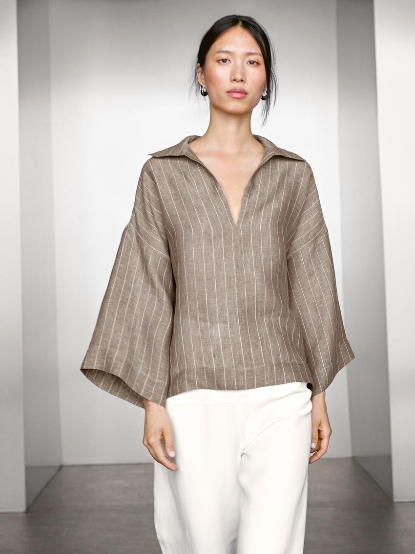 Blouse made of 100% linen fabric. Wide long sleeve. Open shirt collar. Wide and relaxed silhouett... | Massimo Dutti UK