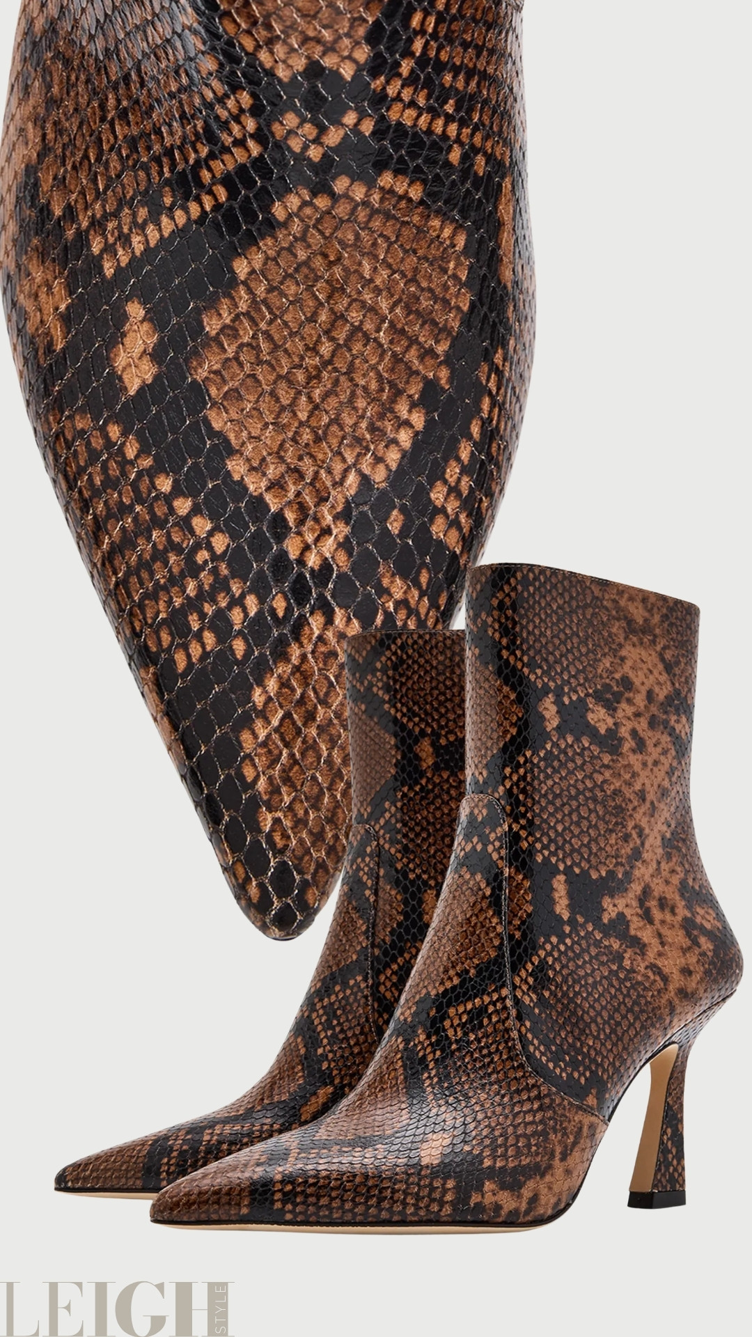 Striking yet sophisticated, these Stuart Weitzman snakeskin ankle boots bring elevated edge to any wardrobe. Designed in rich brown and black reptile print, they feature a sleek pointed toe and a sculpted mid-height heel for a refined silhouette. 

 #LTKootd #LTKWorkwear #LTKTravel
