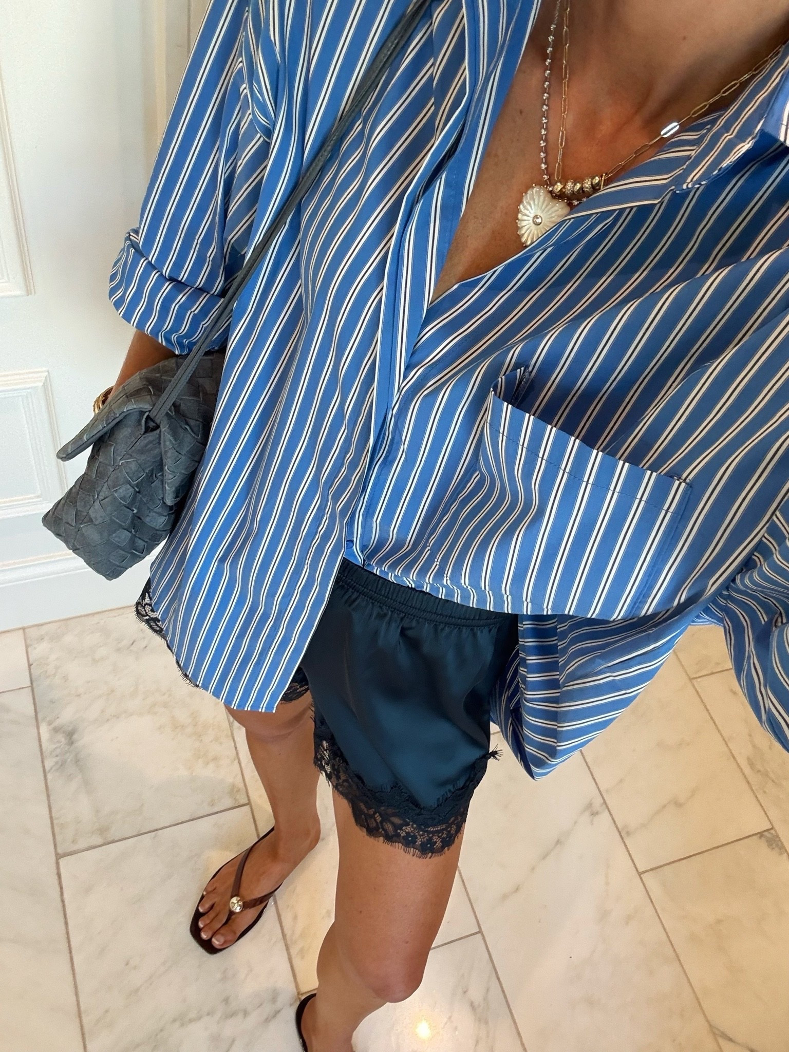 Outfit details! This button up comes in red as well and is such a chic addition to my closet. My shorts are under $60!!

#LTKootd #LTKSeasonal #LTKOver40