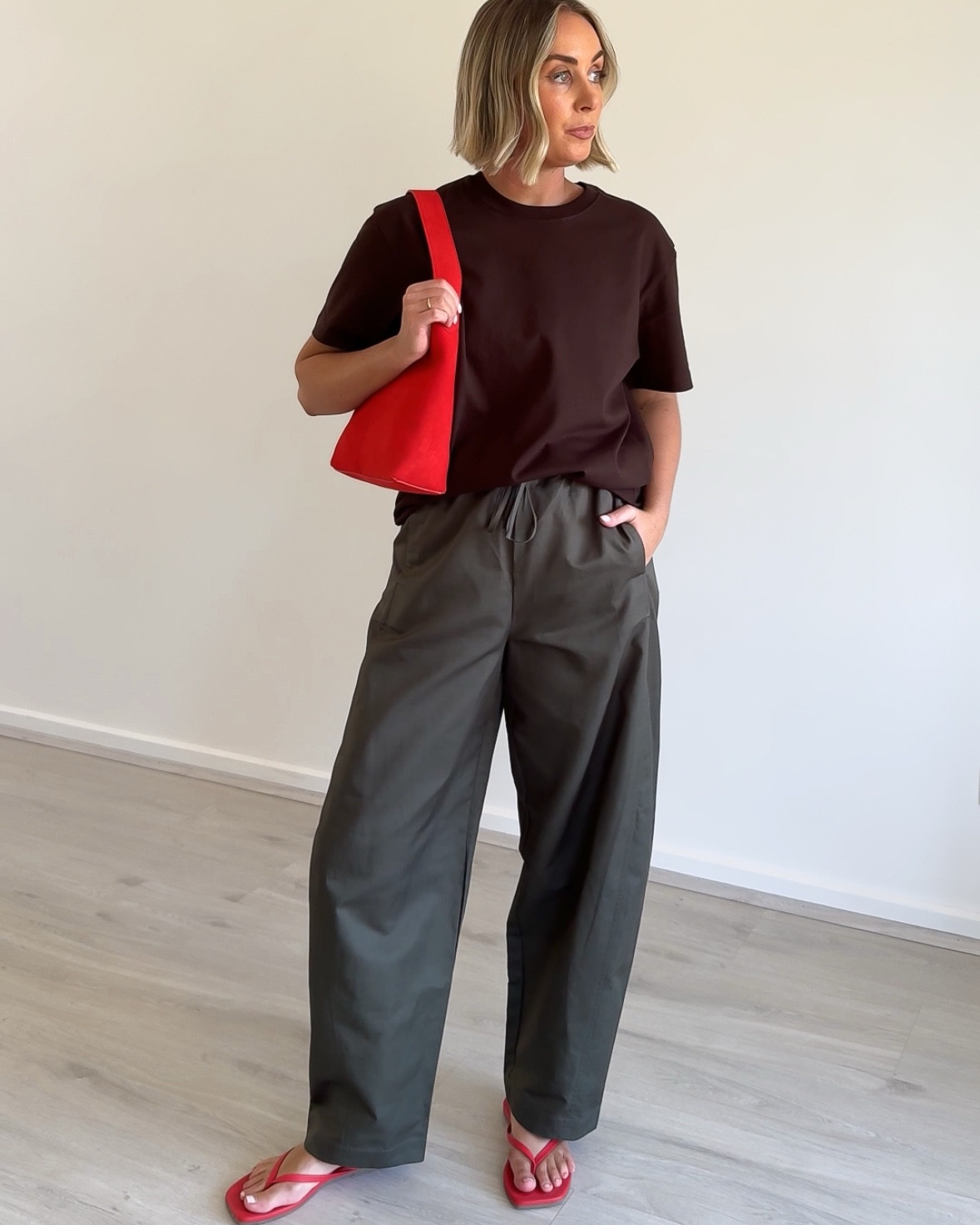 Wearing - 

Outfit 1 
Tee by Assembly Label
Bag by Assembly Label
Barrel leg trousers by Assembly Label
Thongs by Tkees

Outfit 2
Coat by Decjuba
Cardigan by & Other Stories
Bag by The Horse
Jeans by Assembly Label
Boat shoes by Moline

Outfit 3
Sheer Dress by VRG
Bra by Cotton on
Necklace by Heaven Mayhem
Bag by The Horse
Trousers by Assembly Label
Thongs by Tkees

Outfit 4
Shirt by Dissh
Bag by Dragon Diffusion
Trousers by Assembly Label
Thongs by Billini

Outfit 5
Bomber by Jasmine Alexa
Bag by Love Isabella
Cargos by Morrison
Thongs by Billini

Outfit 6
Set by H&M
Bag by H&M
Thongs by Tkees

Outfit 7
Set by Moss Living
Necklace by Heaven Mayhem
Bag by Dragon Diffusion
Sandals by Isabelle Marant

Outfit 8
Tank by Henne
Bag by Betts
Belt by Country Road
Barrel leg trousers by Uniqlo
Thongs by Betts

Outfit 9
Tee by Cos
Necklace by Heaven Mayhem
Bag by Dragon Diffusion
Jeans by Assembly Label
Thongs by Archies

Outfit 10
Coat by Assembly Label
Tee by Lioness
Bag by The Horse
Belt by Country Road
Jeans by VRG Girl
Boat shoes by Mollini

Outfit 11
Tee by Assembly Label
Bag by Dragon Diffusion
Trousers by Assembly Label
Thongs by Betts