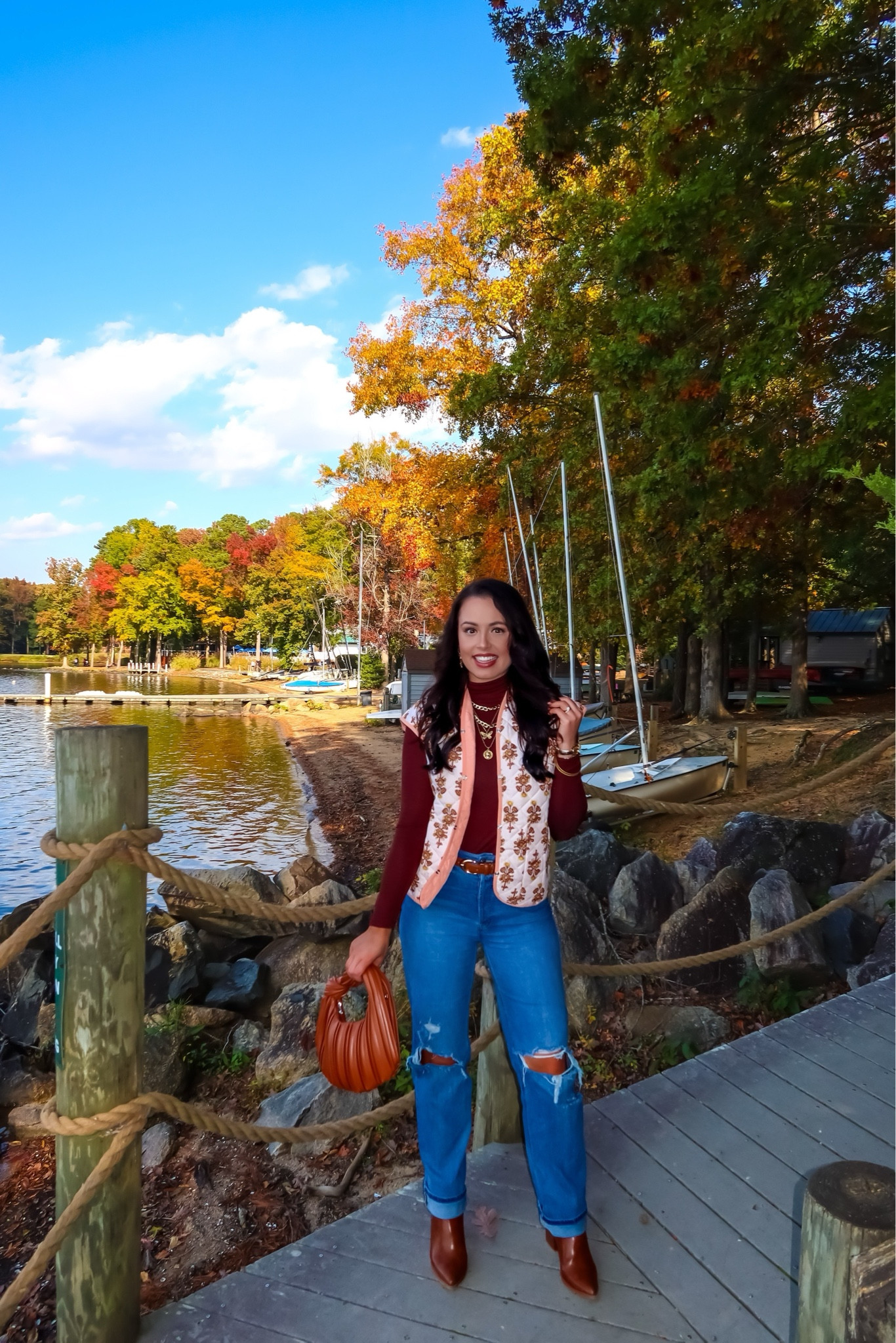 Under $42 Levi’s distressed jeans (27, tts), under $20 Amazon patterned vest (small, 3 colors), under $55 Amazon brown leather booties (tts), under $10 Amazon brown purse, $15 gold necklace set, $15 pack of Amazon belts and under $15 Amazon brown cropped turtleneck (small, 5+ colors) #founditonamazon 

#LTKSaleAlert #LTKHoliday #LTKFindsUnder50