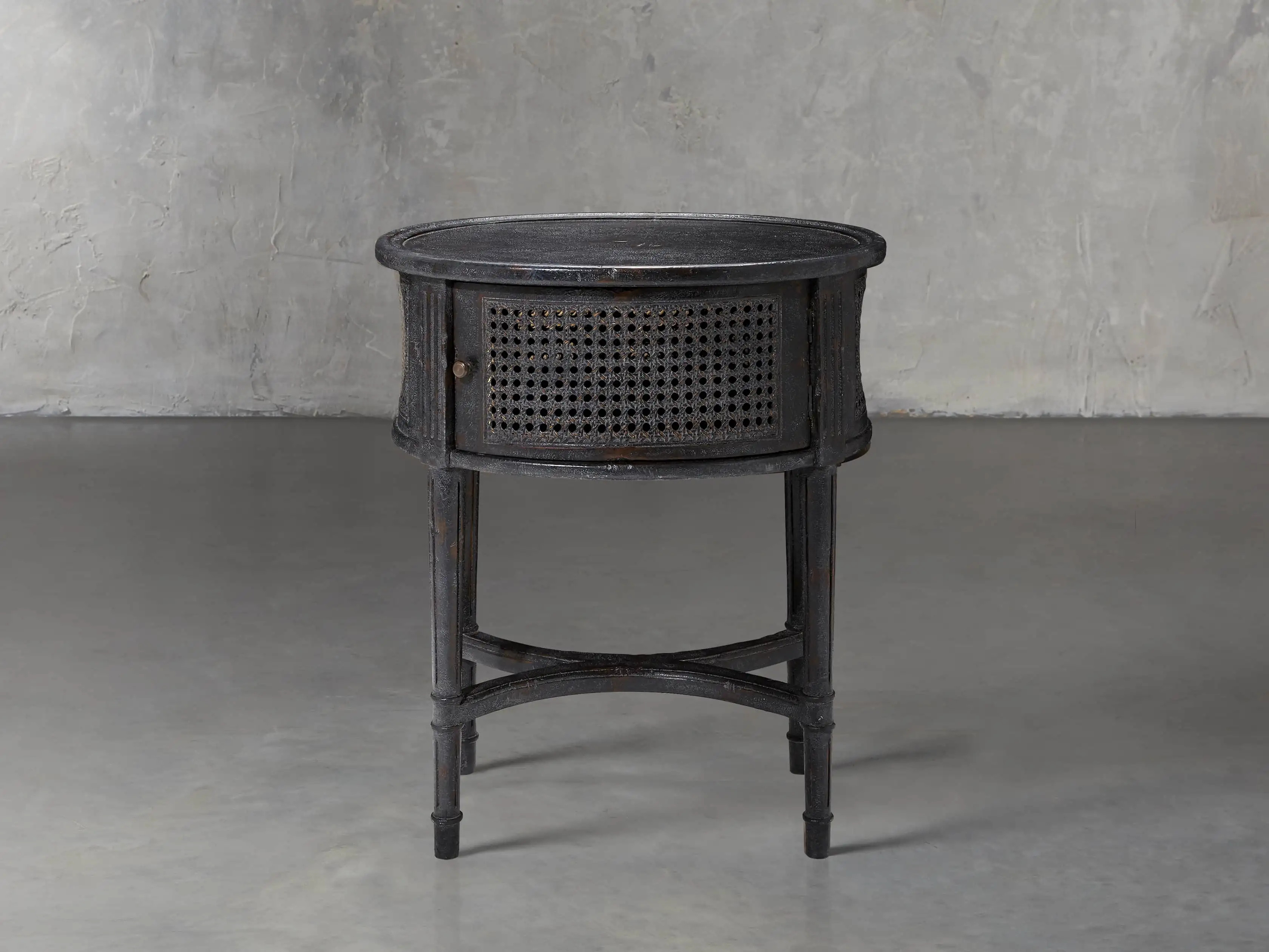 Merle Caned End Table in Black | Arhaus