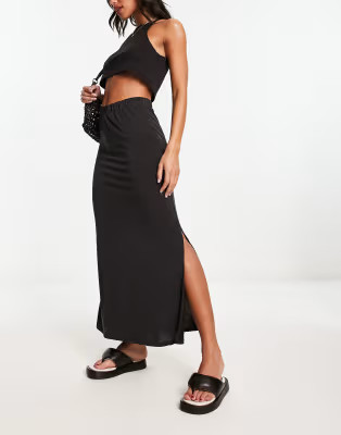 Vila slinky maxi skirt with slit sides in black | ASOS (Global)
