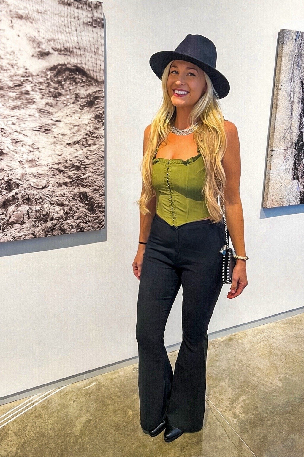Dark flares, statement hat, and a corset top that deserves its own encore 🖤🎶  This look had me concert ready from boots to brim!

#LTKootd #LTKTravel #LTKdayinmylife
