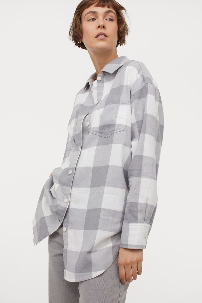 Long shirt in soft cotton twill. Collar, buttons at front, and yoke at back with box pleat. Open ... | H&M (US + CA)