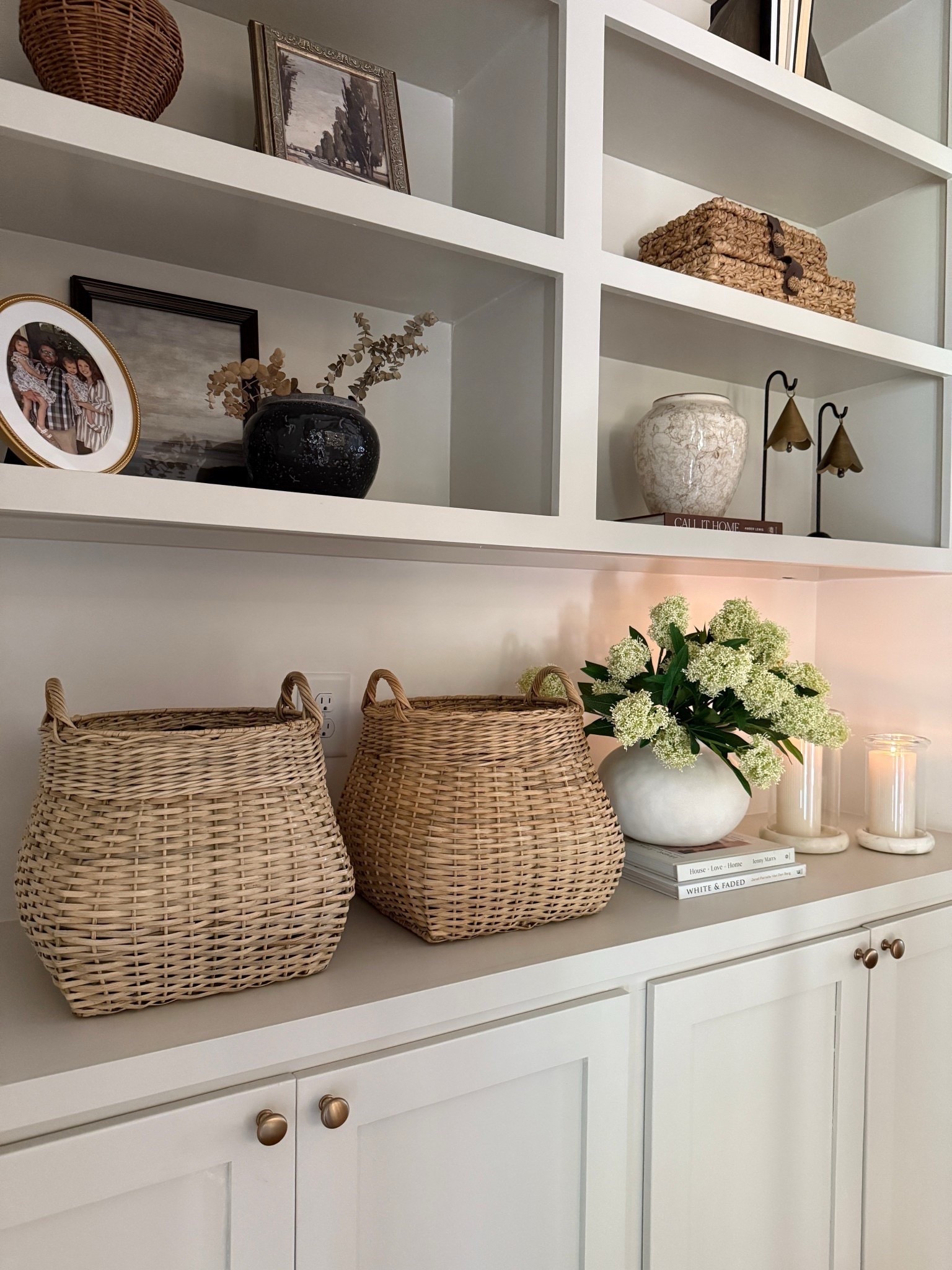 Simple and timeless bookshelf styling! I love mixing woven baskets or boxes with modern frames and vintage pieces!

#LTKFindsUnder50 #LTKHome #LTKSeasonal