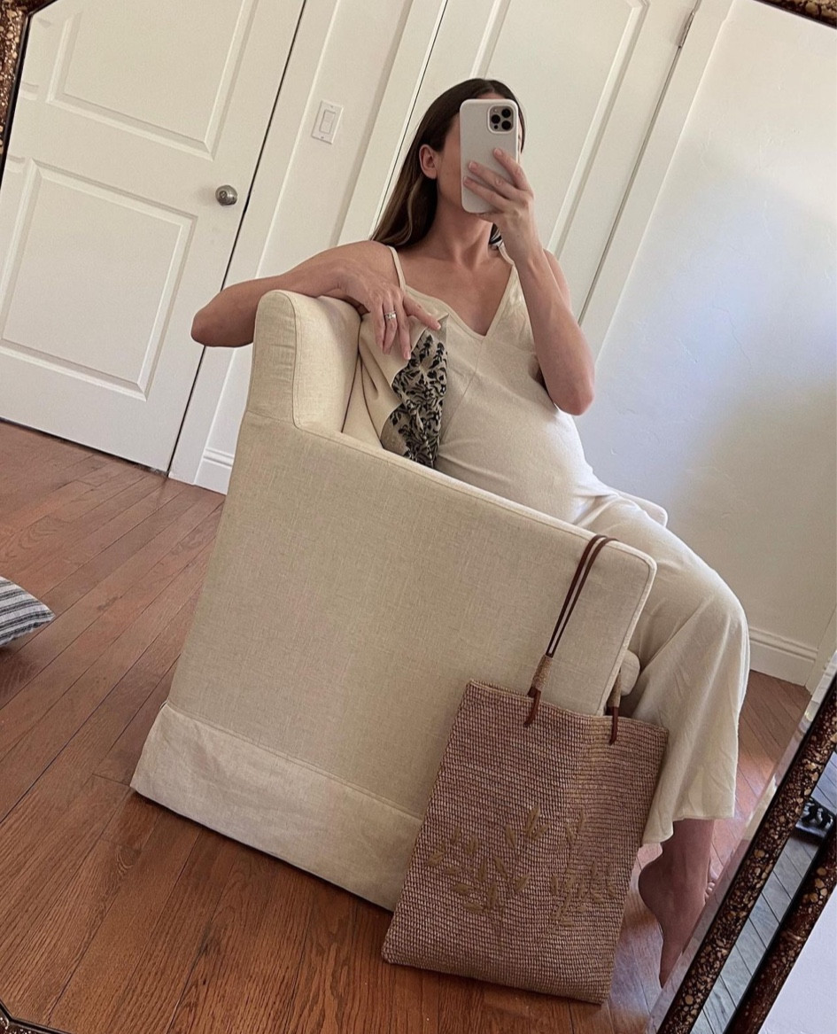 Jenni Kayne Rio Slip Dress was one of my maternity favorites last summer & it looks so cute topped with a sweater, too. 🤎 wearing my usual size, it runs big!

Also shared my straw bag, office chair and printed throw pillow 〰️

Bump style 

#LTKSeasonal #LTKFind #LTKbump