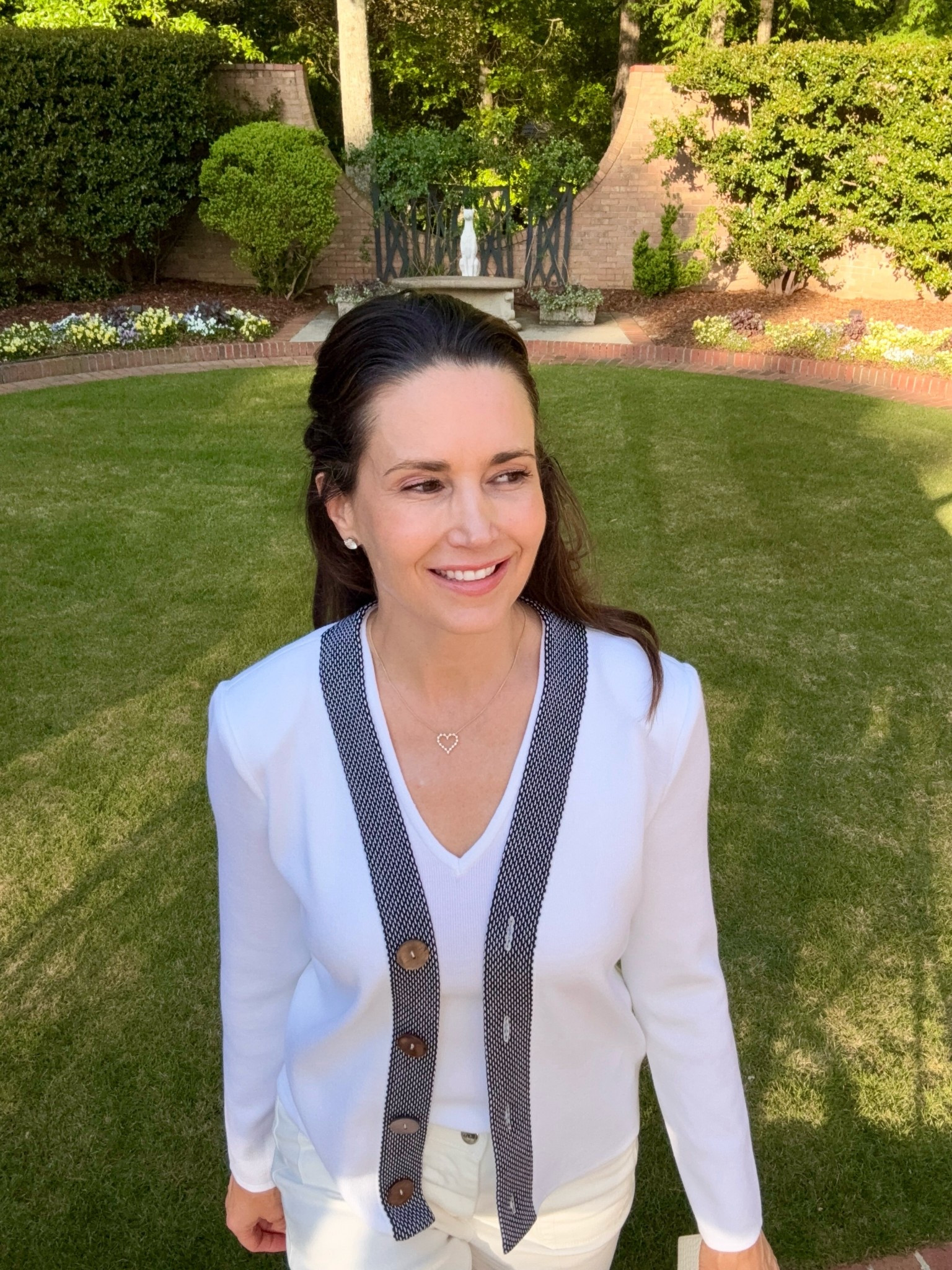 White Cardi + White Denim = Effortless Spring Uniform

Spring's here with Summer on its way! 
My roses are blooming and hydrangeas are beginning to green. 

This white cardigan set welcomes this Spring weather. A knit cardi with black textured trim, shell underneath along with cropped wide leg jeans give minimal color, but maximum impact. 

Newly launched collection by @Family_Savvy x @MingWangOfficial embraces timeless style with a modern edge.

#LTKootd #LTKOver40 #LTKgrwm