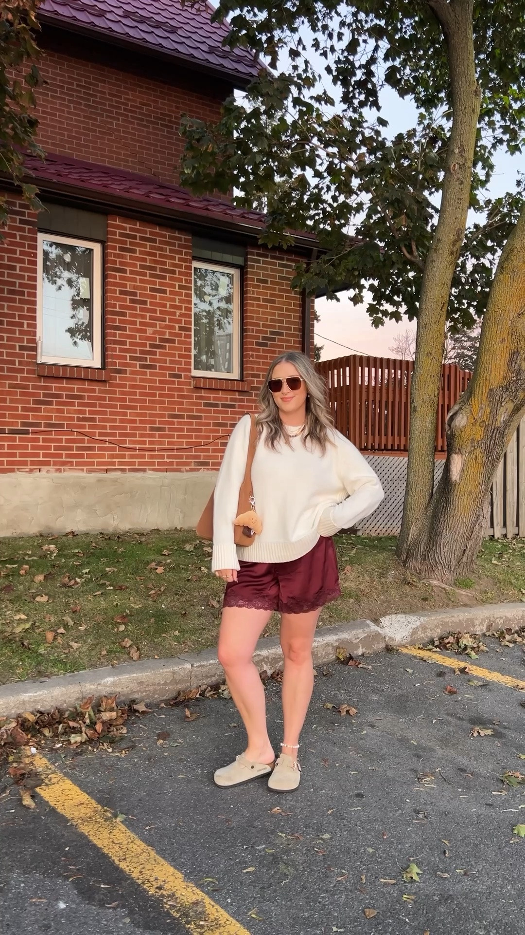 Comfy fall outfit! Sized up to XL in the sweater for an oversized fit. Wearing M in the satin lace shorts. I’m a 9.5-10 shoe and wear a 40 in the Birkenstock clogs

#LTKfall #LTKsale #LTKstyletip