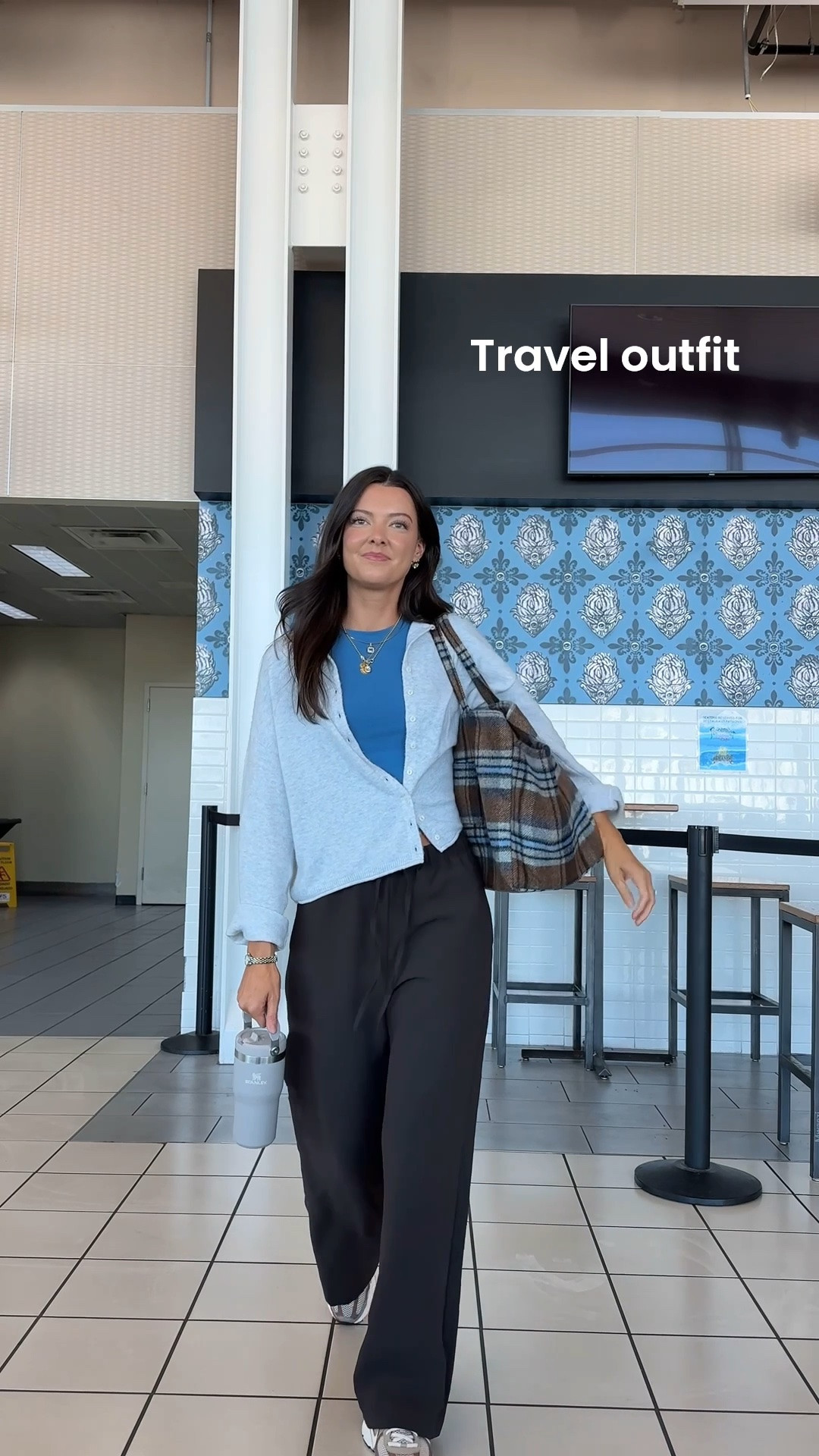 Proof that your travel outfit can be functional, polished AND comfortable! I am 5’7” wearing my usual size small in regular length in the pants and XS in the top and sweater.