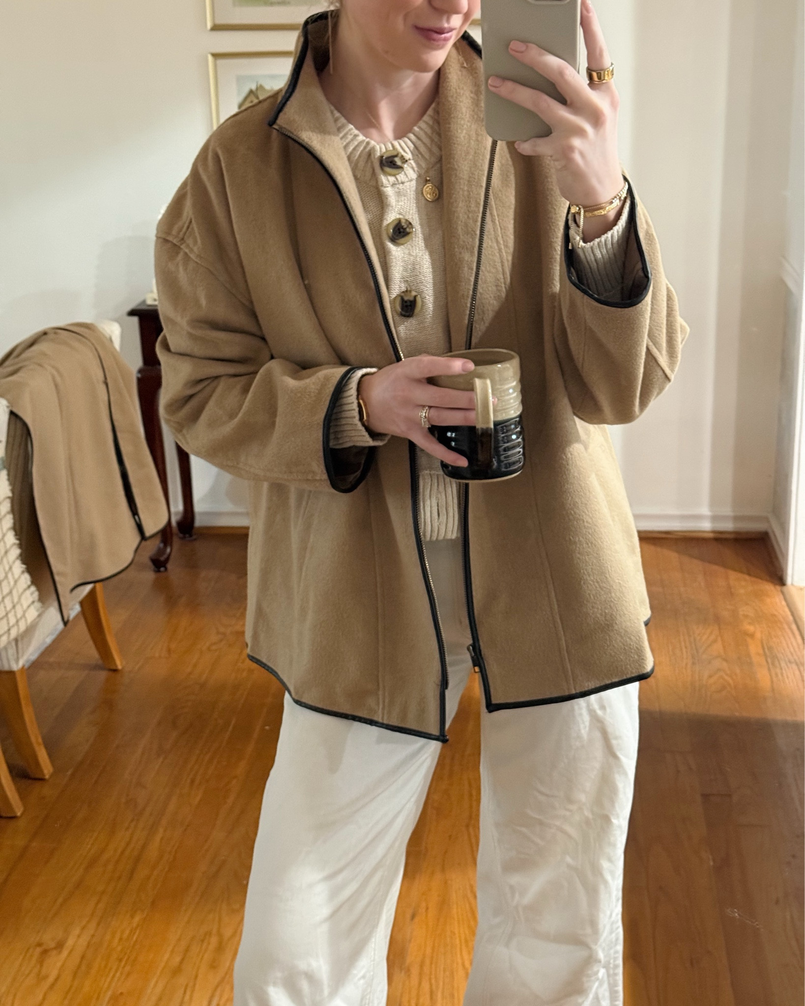 An easy neutral winter outfit I wore to the office featuring white jeans, a cozy cream cardigan, a brown oversized jacket, and black cowboy boots. Simple, comfy, and perfect for everyday winter work outfits.

#LTKFindsUnder100 #LTKWorkwear #LTKootd