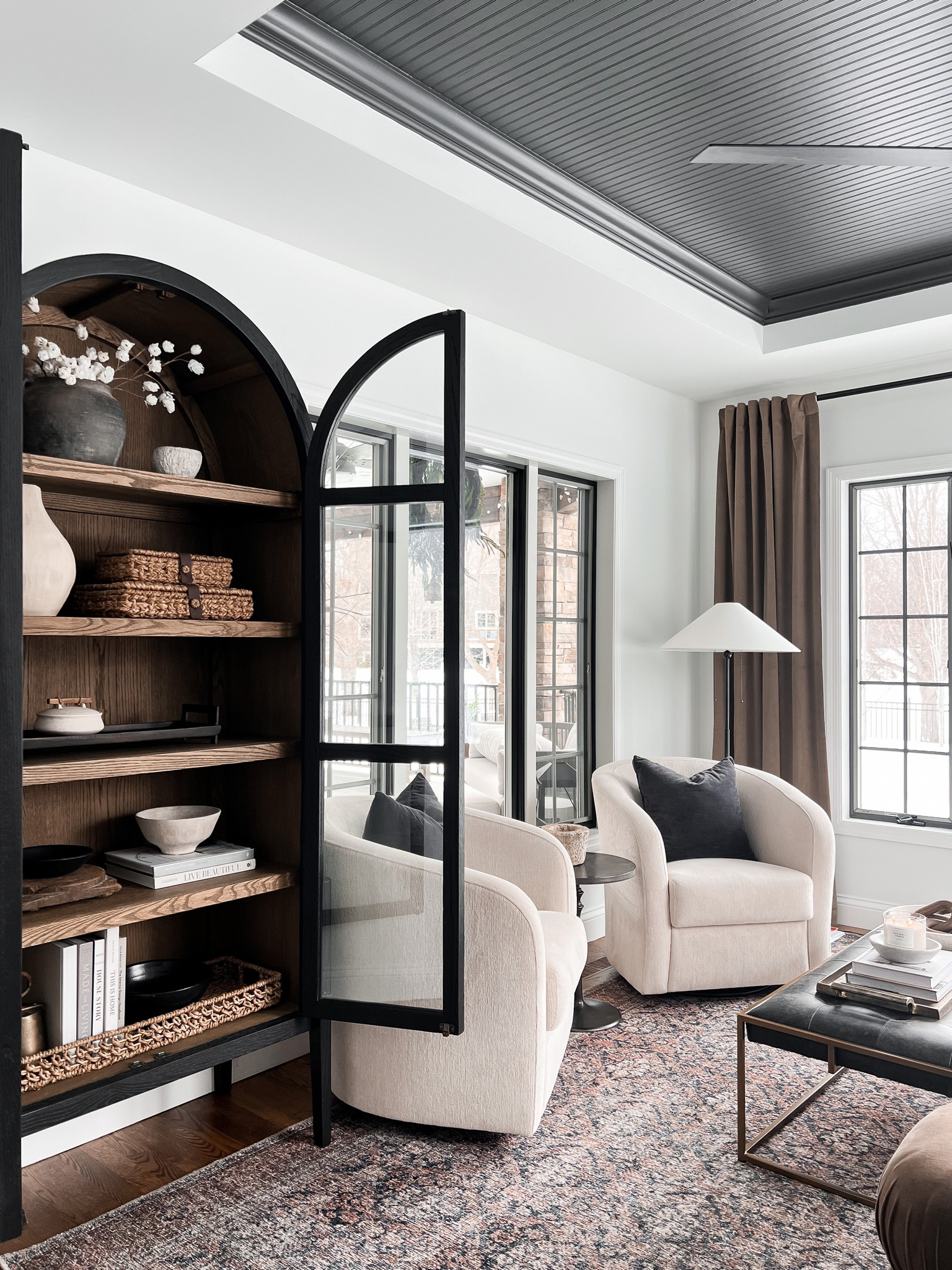 Sitting room inspo with beautiful arched display cabinet 

#LTKFind #LTKstyletip #LTKhome