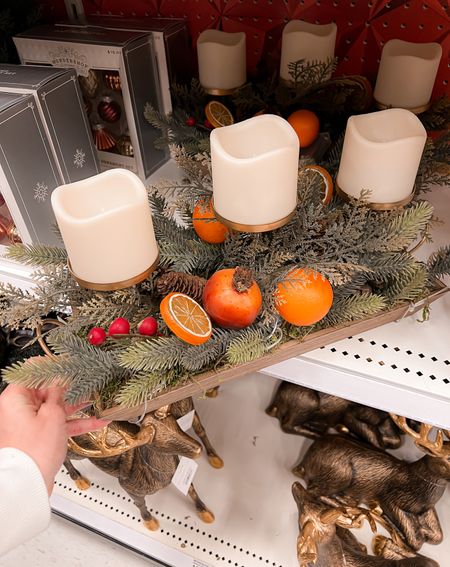 Faux candle (battery operated) beautiful centerpieces at Target. 

#LTKSeasonal #LTKHoliday #LTKhome