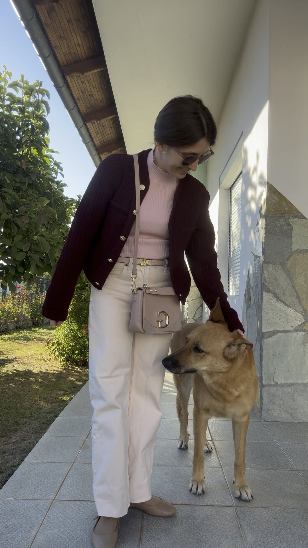 It wouldn’t be me if I didn’t wear a pink outfit at least once on the vacation! 
I combined a pink halterneck top, pink jeans and bag, a burgundy cardigan and beige ballet flats. 
I needed a comfortable outfit to travel to Thessaloniki for the wedding and what is better than pink! ☺️

#LTKautumn #LTKeurope #LTKtravel