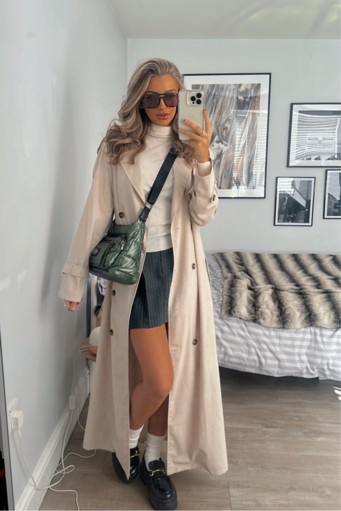 Cream trench coat, grey mini skirt, pleated skirt, metallic puffy bag, silver bag, white knit turtleneck, chunky loafers, sunglasses, transitional pieces, outfit ideas 

#LTKstyletip #LTKSeasonal #LTKeurope