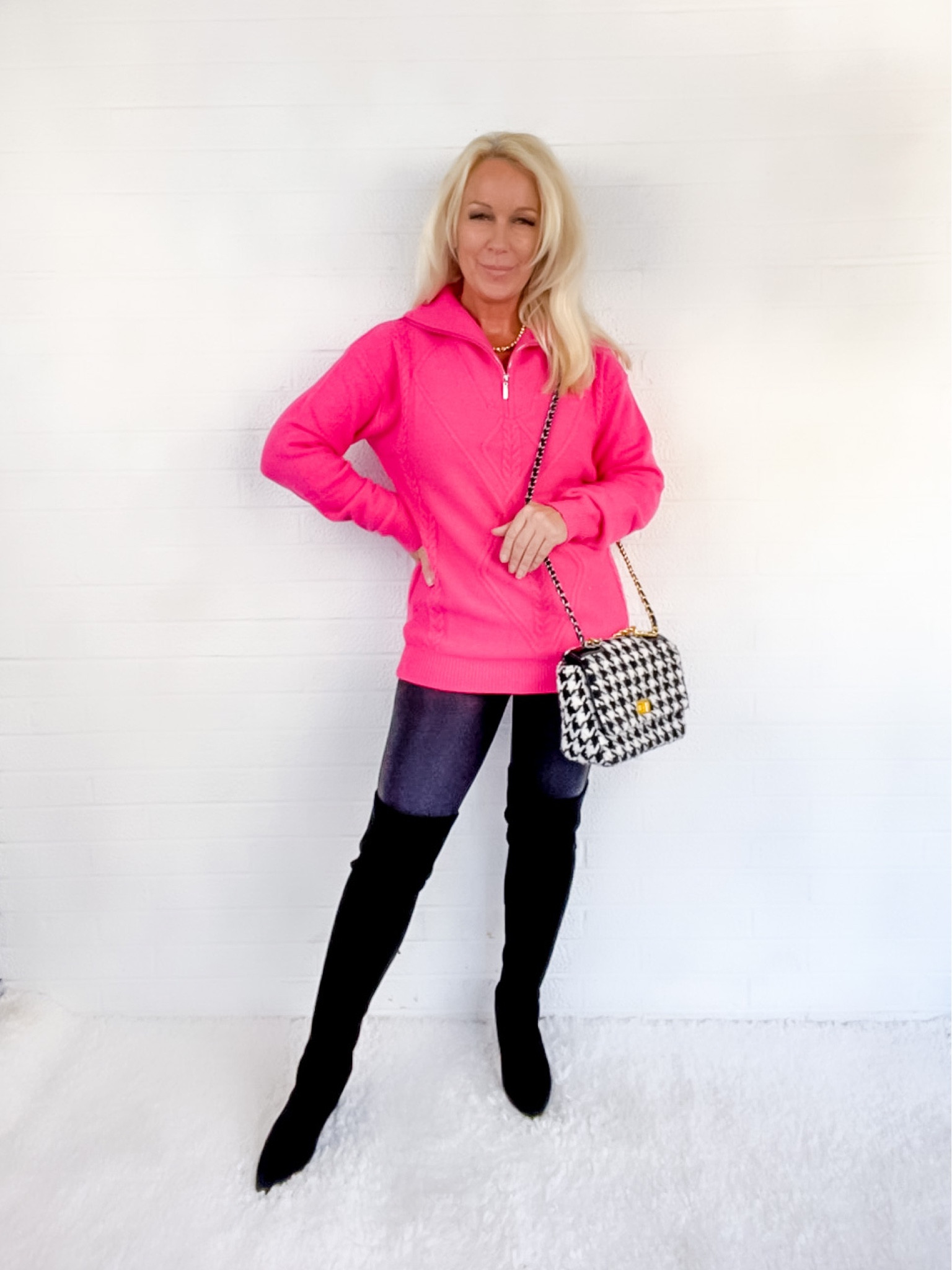 Pink quarter zip sweater paired with black liquid leggings & black over the knee boots. Houndstooth handbag. Over 40. Over 50. Over 60.

#LTKunder50 #LTKshoecrush #LTKSeasonal
