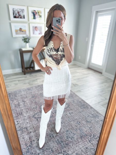 Amazon country concert outfit. Amazon fringe skirt in XS. Festival outfit. Amazon country tank top in small. Nashville outfit. Bachelorette party. Amazon cowgirl boots are TTS and very comfortable + petite-friendly. 

#LTKTravel #LTKShoeCrush #LTKFestival