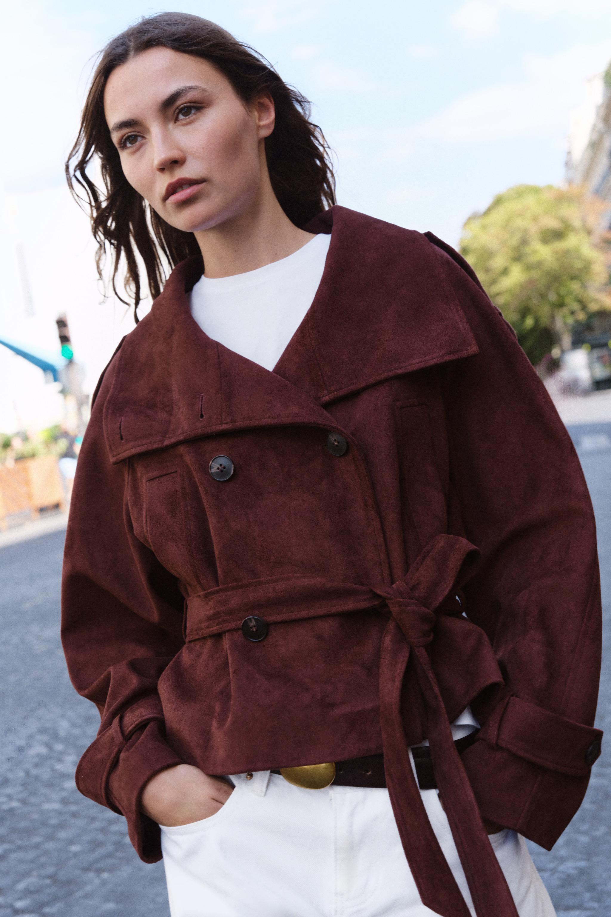 Model height: 178 cmFaux suede jacket with a high collar and long sleeves finished with buttoned ... | Zara UK
