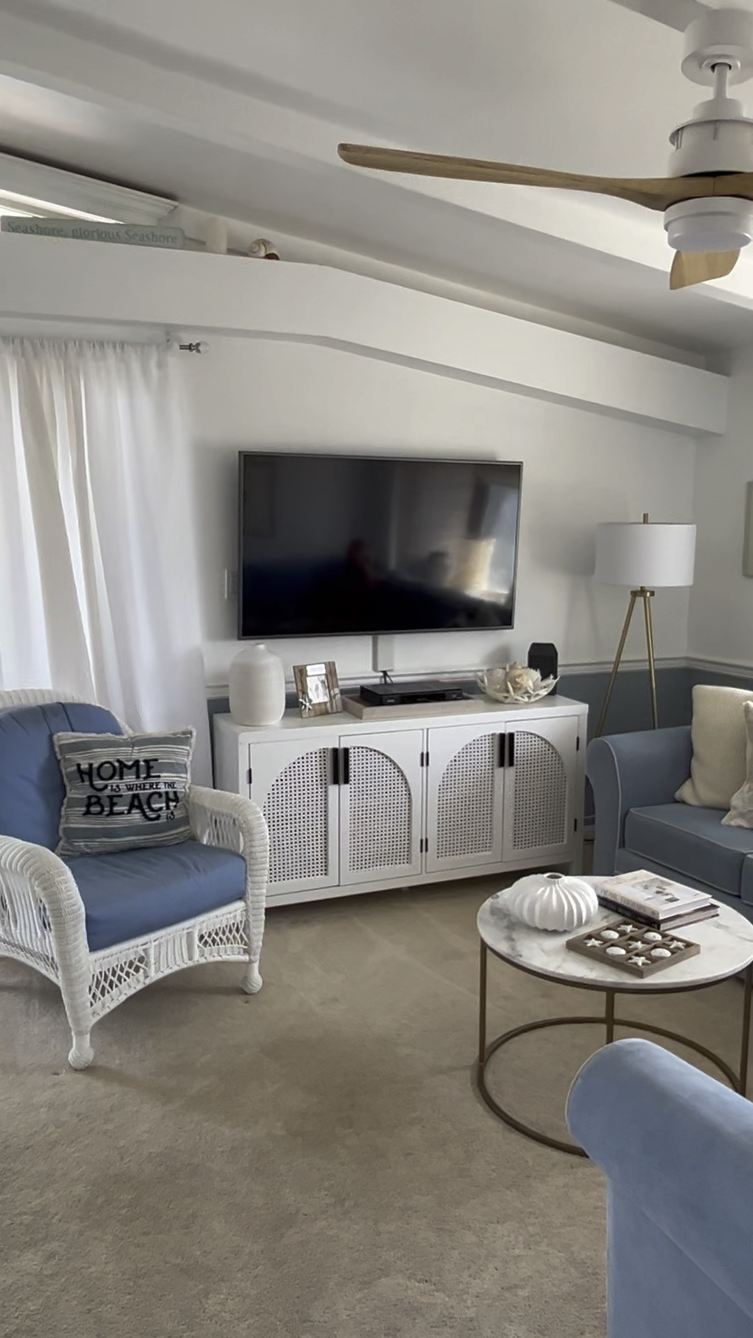 Love our New white media console with rattan cabinet doors.

Natural light wood ceiling fan with light. Three blade ceiling fan, natural white ceiling fan with light.

Round coffee table, tripod floor lamp, brass floor lamp on sale. 

Woven bamboo Roman shade from Amazon.

#amazon #target


#LTKFind #LTKhome #LTKstyletip