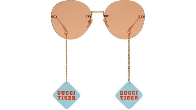 Gucci - Gucci Tiger round-frame sunglasses with pendant | Gucci (US)
