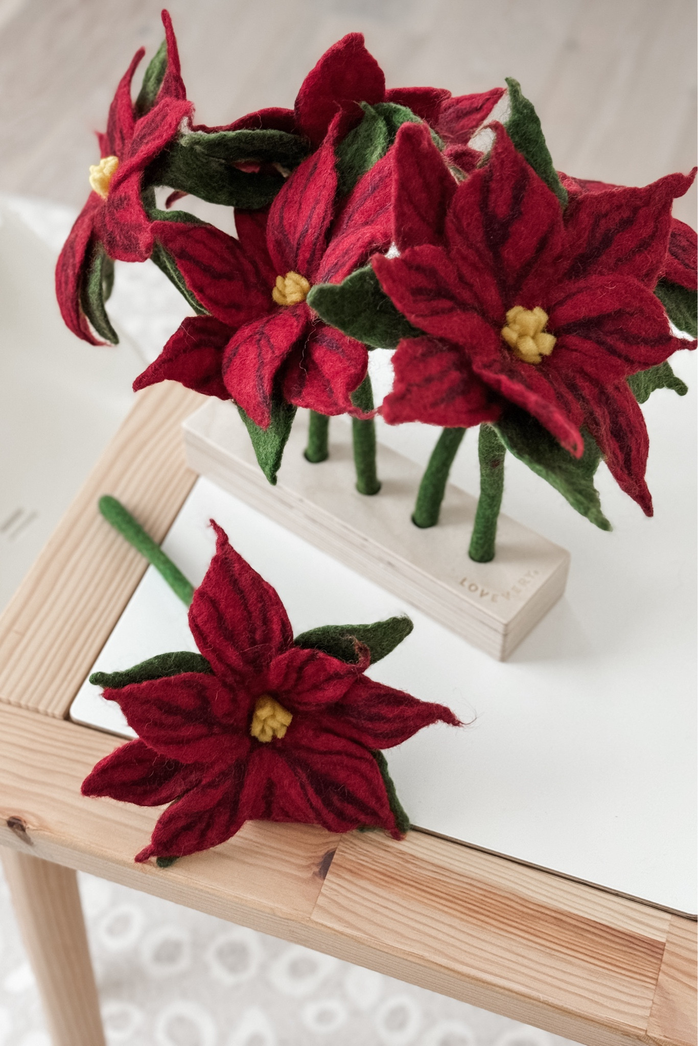 Okay, how cute are these felted poinsettias?! They are beautifully crafted and fit perfectly in the felt flower display block from the Lovevery “Helper Play Kit” Box! These are going to be so fun for our #LTKToddler to play with to celebrate the #LTKHoliday season! 

#LTKSeasonal