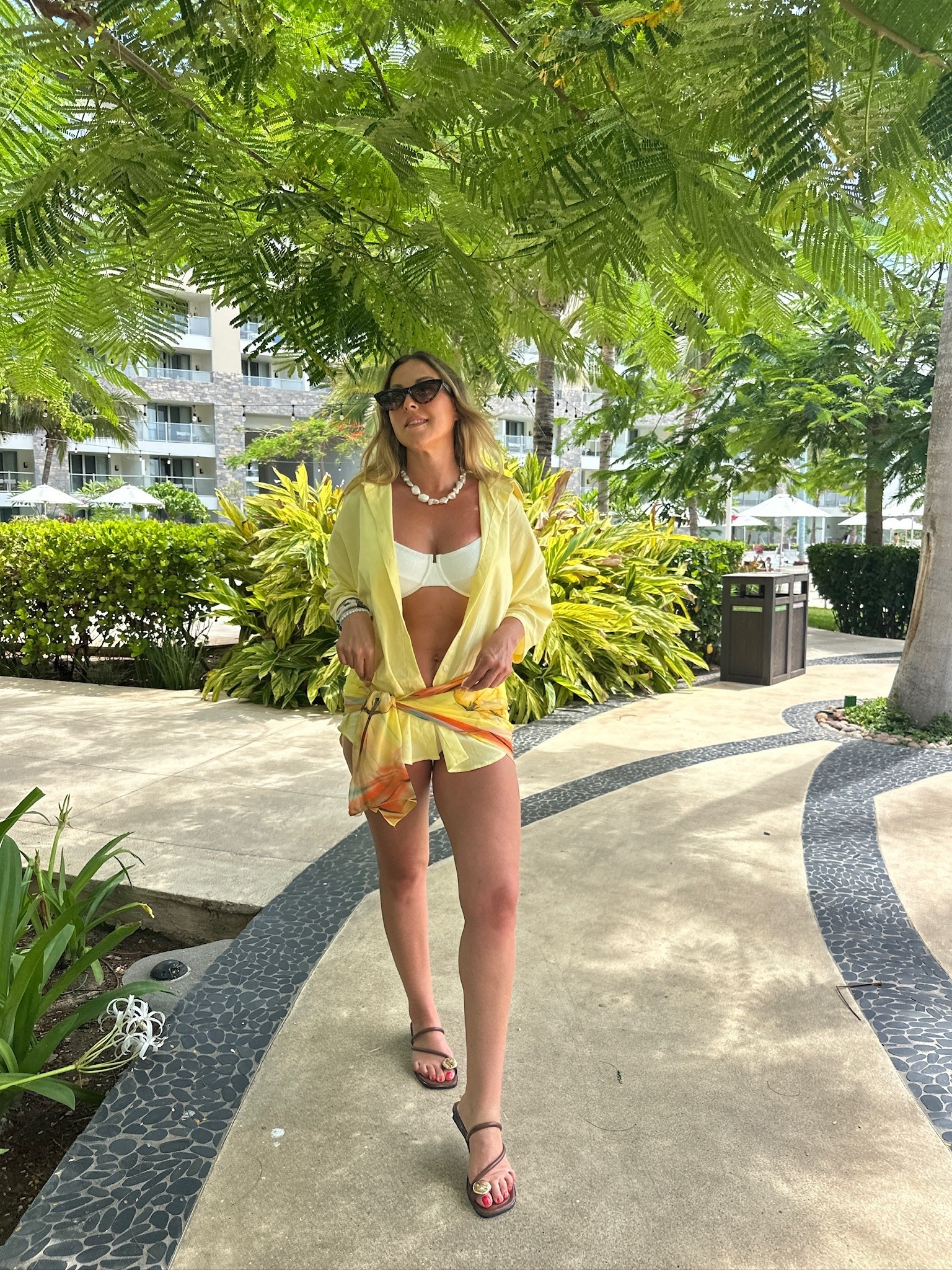 I am sharing this daytime outfit. I am wearing one of my Vetchy bikinis in white, with a yellow button down as a coverup with a scarf tied at my waist to add an interesting touch! Then I'm finishing off my outfit with my new fave sandals, sojos sunglasses (use code NICHOLESJ for a discount) and my pearl necklace! All items linked⬆️

#Itkcreator #Itkfinds
#Itkwatchnow #amazon #amazonfinds #beach #swim #coverup #sunglasses #sandals #summer #summerfinds #summeroutfits

#LTKgrwm #LTKootd #LTKSwim