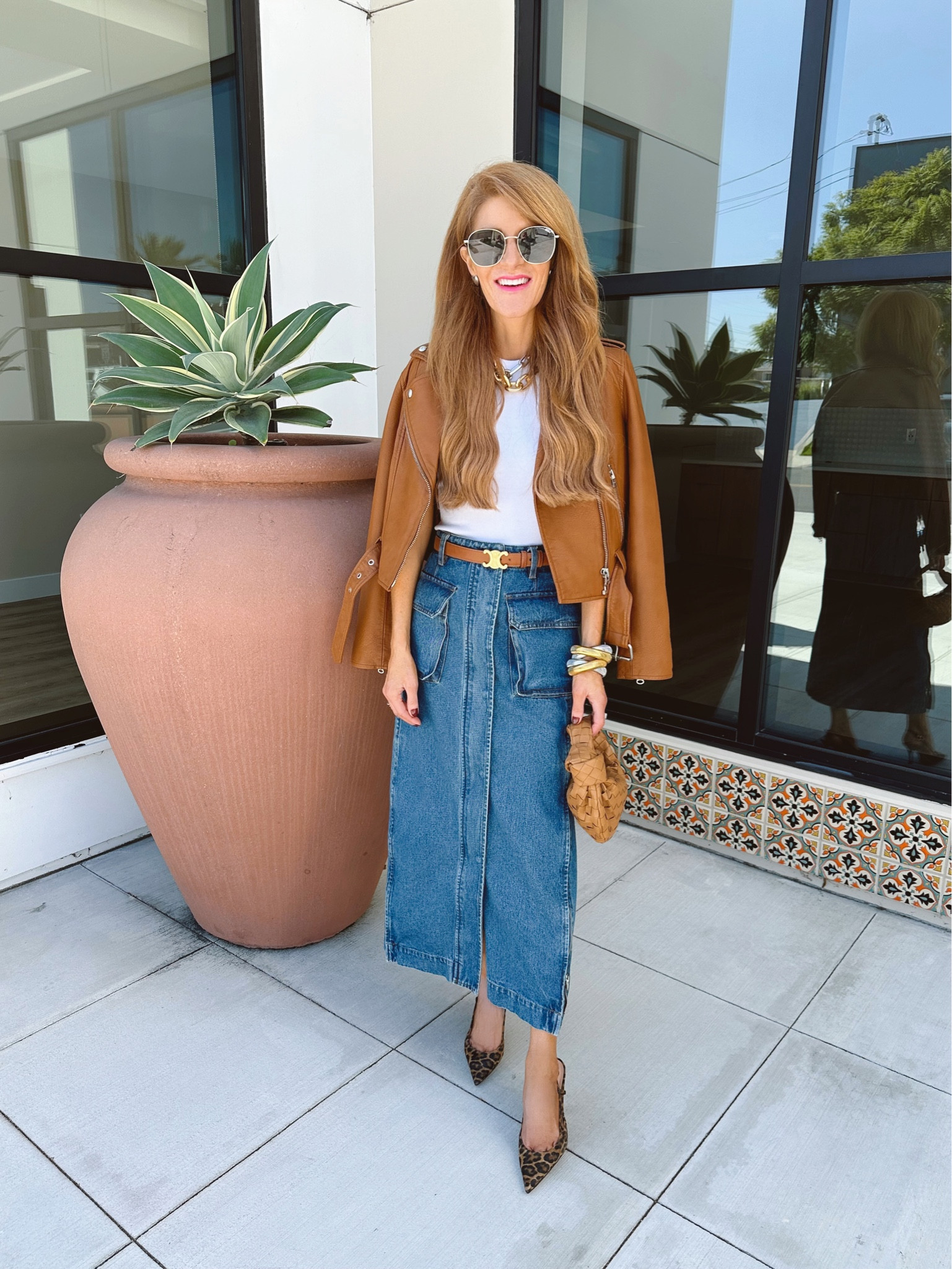 Love this leather moto jacket and its 30% off right now! Wearing xs. With this denim cargo midi skirt, simple white tank 🤎

#LTKsalealert #LTKSeasonal #LTKshoecrush