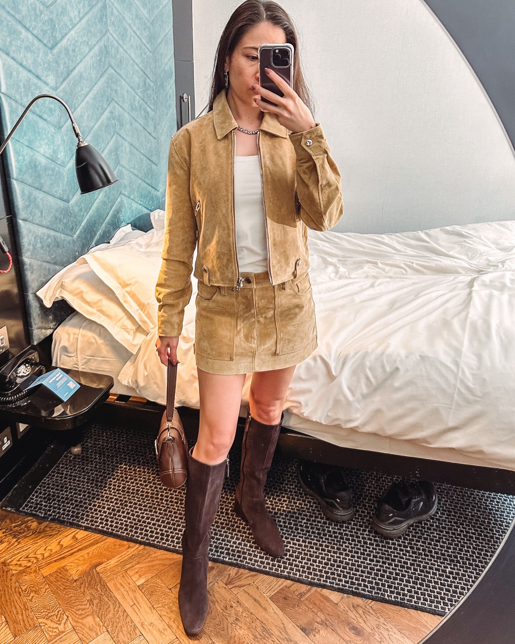 My favorite outfit lately. Wore this to our trip to London last week. It’s a great spring look and will be perfect for the fall, too. Suede skirt and jacket with knee high suede boots and a white tee. 

#LTKPetite #LTKShoeCrush #LTKTravel
