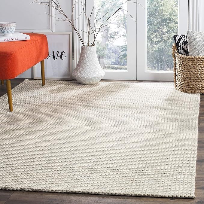SAFAVIEH Natura Collection 8' x 10' Silver / Ivory NAT801G Handmade Solid Wool Area Rug | Amazon (US)