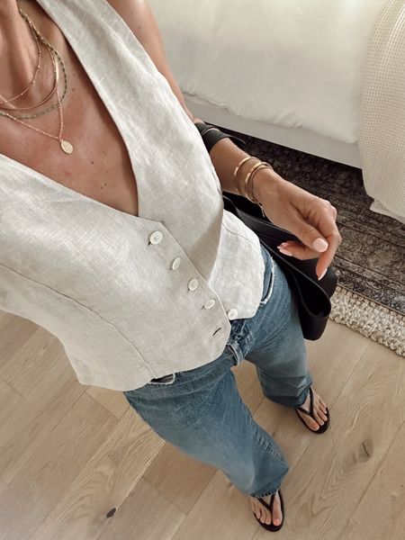 Today’s casual spring outfit 
Linen vest has an adjustable back, and I went up 2 sizes from my regular brand size for a looser fit (wearing a 2) 
Trouser jeans (had to hem these) 
Comfortable sandals 10% off with code ITSYBITSYINDULGENCES10) 

#LTKover40