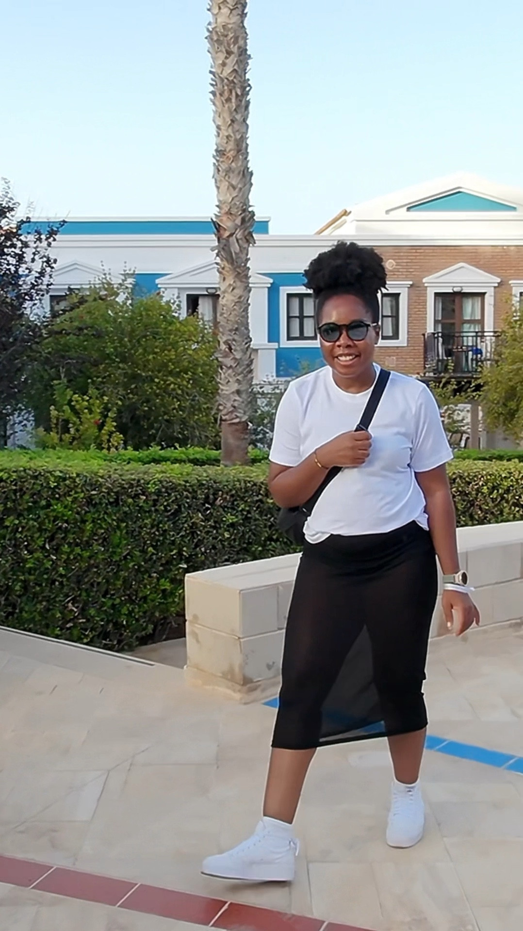 Final day to show off my holiday outfits 😝 travel day though so needed to find a happy medium between resort chic and travel comfort. Went for a classic white tee, sheer midi skirt, platform white trainers, bandeau bra / crop top and my ever faithful Uniqlo hold everything bag - although I will definitely size up for my next travels! Skirt was ok sale the last time I checked so run don’t walk 😅 

#LTKeurope #LTKtravel #LTKuk