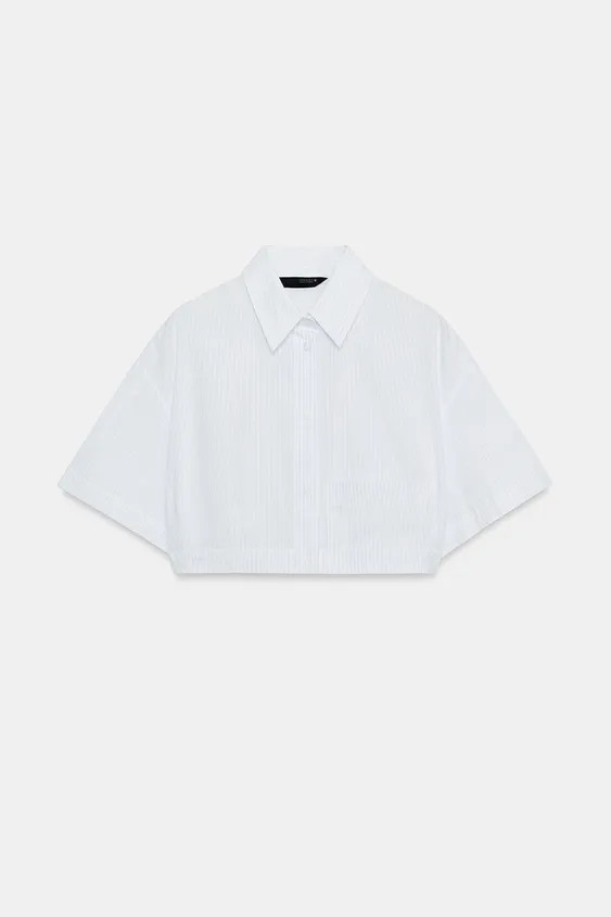 Lapel collar shirt with short sleeves. Front patch pocket. Elasticized hem. Front button closure. | Zara US