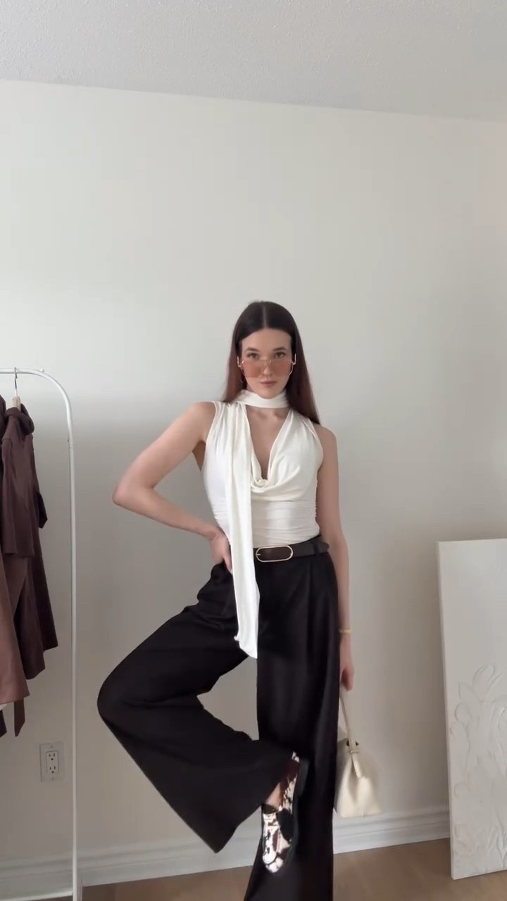 can confirm brown & white are my official S/S go-to colour combo 

outfit details:
@commense.official scarf top
@zara trousers
@stevemadden loafers
@dynamiteclothing belt
@bob.ore.bluecollection purse
@lolarose watch
@fundaoera sunnies 
@maisonmargielafragrances perfume
@yslbeauty lipstick

#ootd #dailyoutfitinspo #wearthisnext #pinterestinspired #outfitinspiration #stylingtips #cowprint #pinterestfashion #springoutfitideas #summeroutfit #springfashion #outfitcheck #grwm #outfitdetails #chicstyle #dailylook #elegantstyle