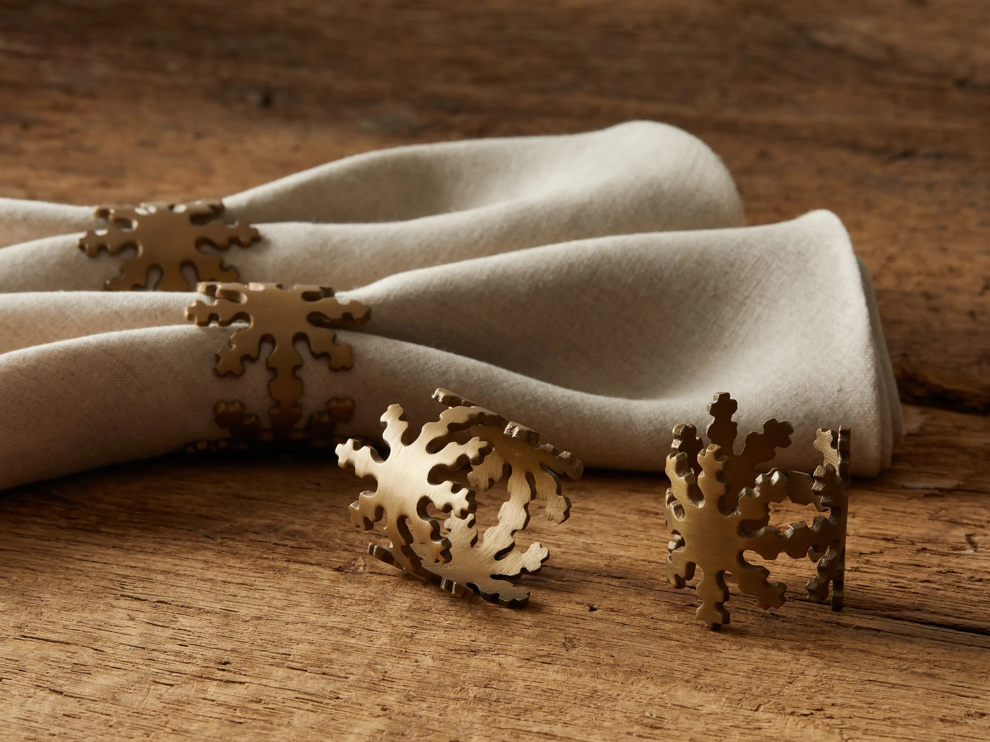 Snowflake Napkin Rings in Antique Brass | Arhaus