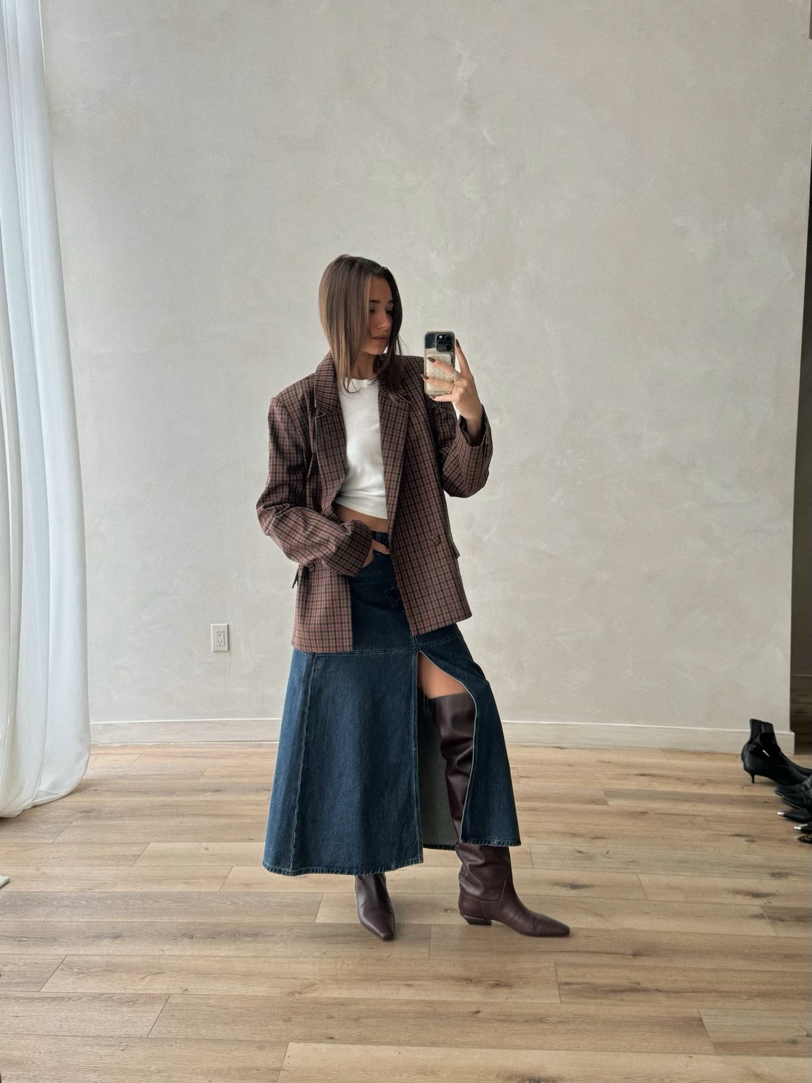 A styled look from my new fall collection. Obsessed with this skirt 🤎