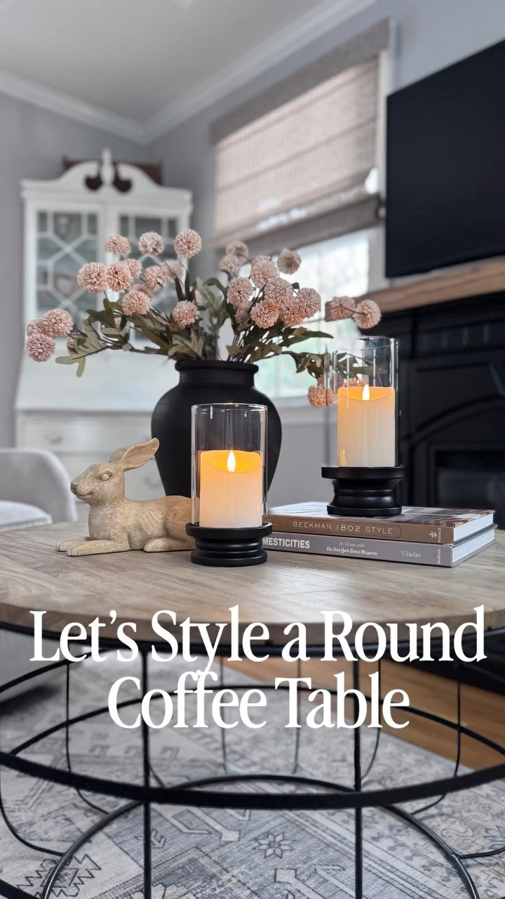 I’ve pulled together some of my favorite pieces to show how simple it can be to style a round coffee table. 

PS: I have already shared my $20 set of gold hurricanes with you and these are the SAME ones in black! 🖤 Happy Saturday! 

For links to all the pieces used here, comment SHOP and I’ll DM them all right to you! (be sure to give a follow up first, so IG doesn’t block my DM) 

#coffeetable #homedecor #tabletop #decor #floral