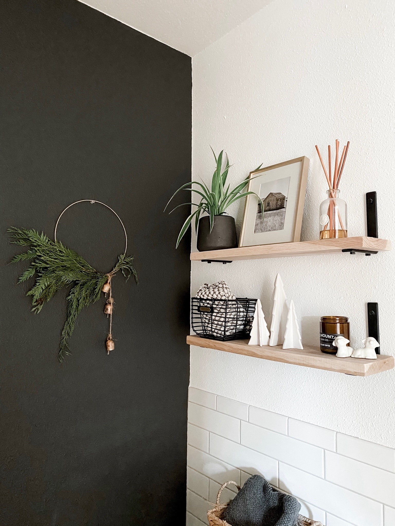 Christmas bathroom decor - simple shelf styling plus a modern wreath on the wall makes for minimal classy holiday decorating. 

#LTKHoliday #LTKSeasonal #LTKHome