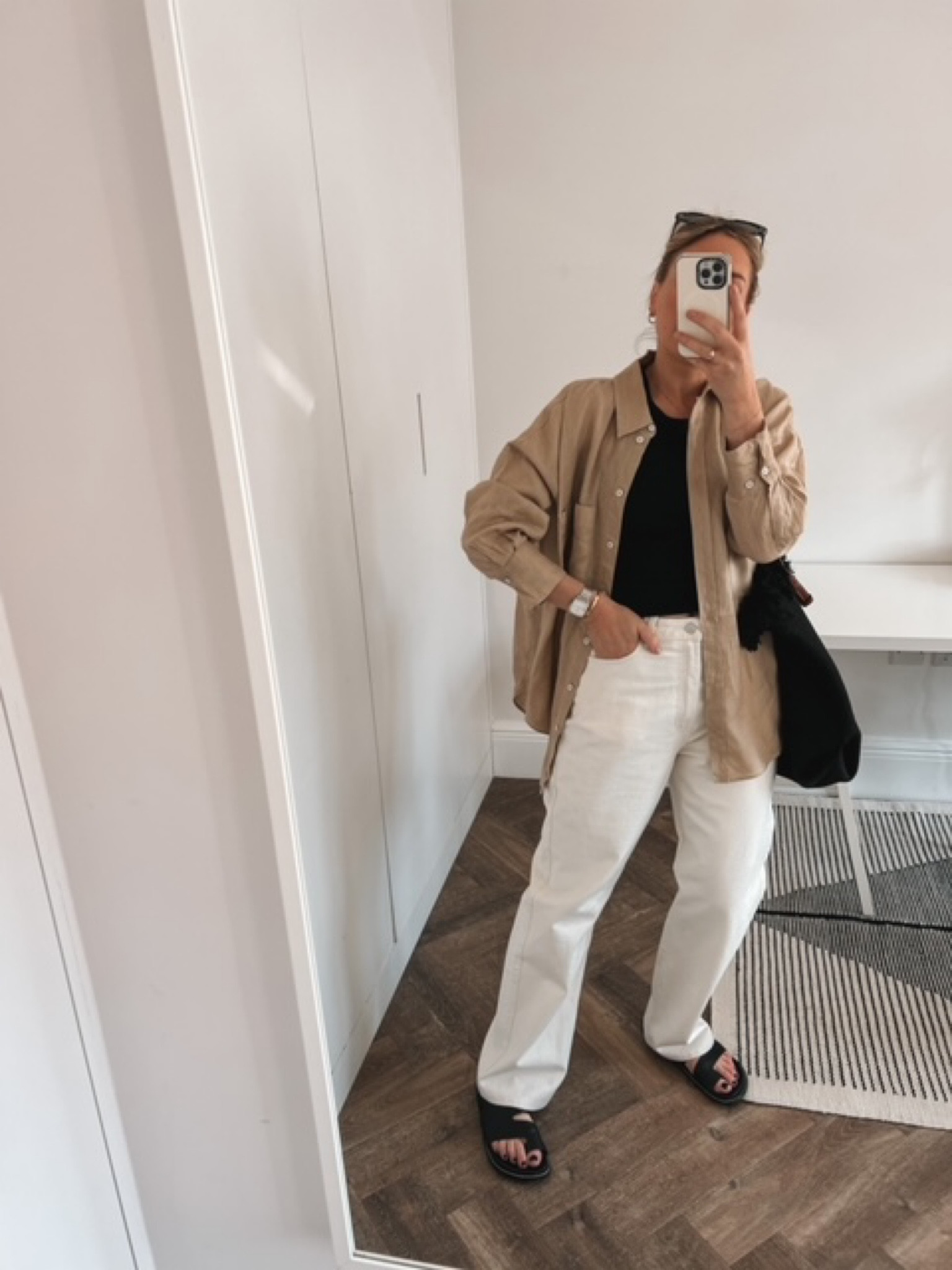 Linen shirt, beige linen, black vest, summer vest, black shoulder bag, large shoulder bag, white jeans, straight leg jeans, straight white jeans, chunky sandals, black sandals, black chunky sandals, Pull & Bear, Boden, Weekday, Jigsaw, COS

#LTKeurope #LTKstyletip #LTKSeasonal