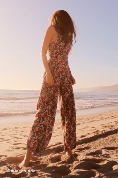UO Lola Smocked Halter Jumpsuit - Assorted XS at Urban Outfitters | Urban Outfitters (US and RoW)