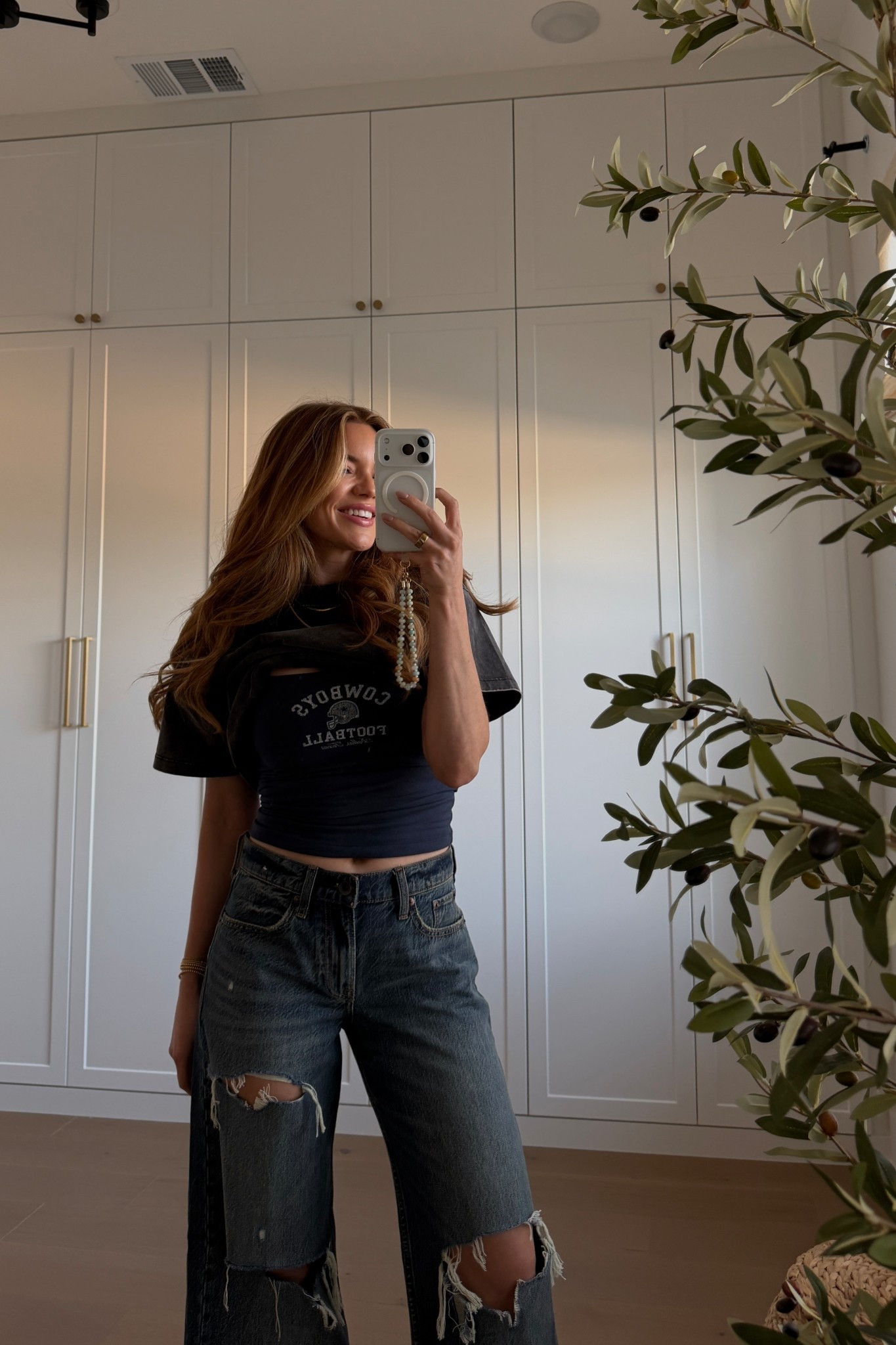 acid wash tee: small // cowboys bra tank: xs // jeans: 24 regular length (i’m 5’3)