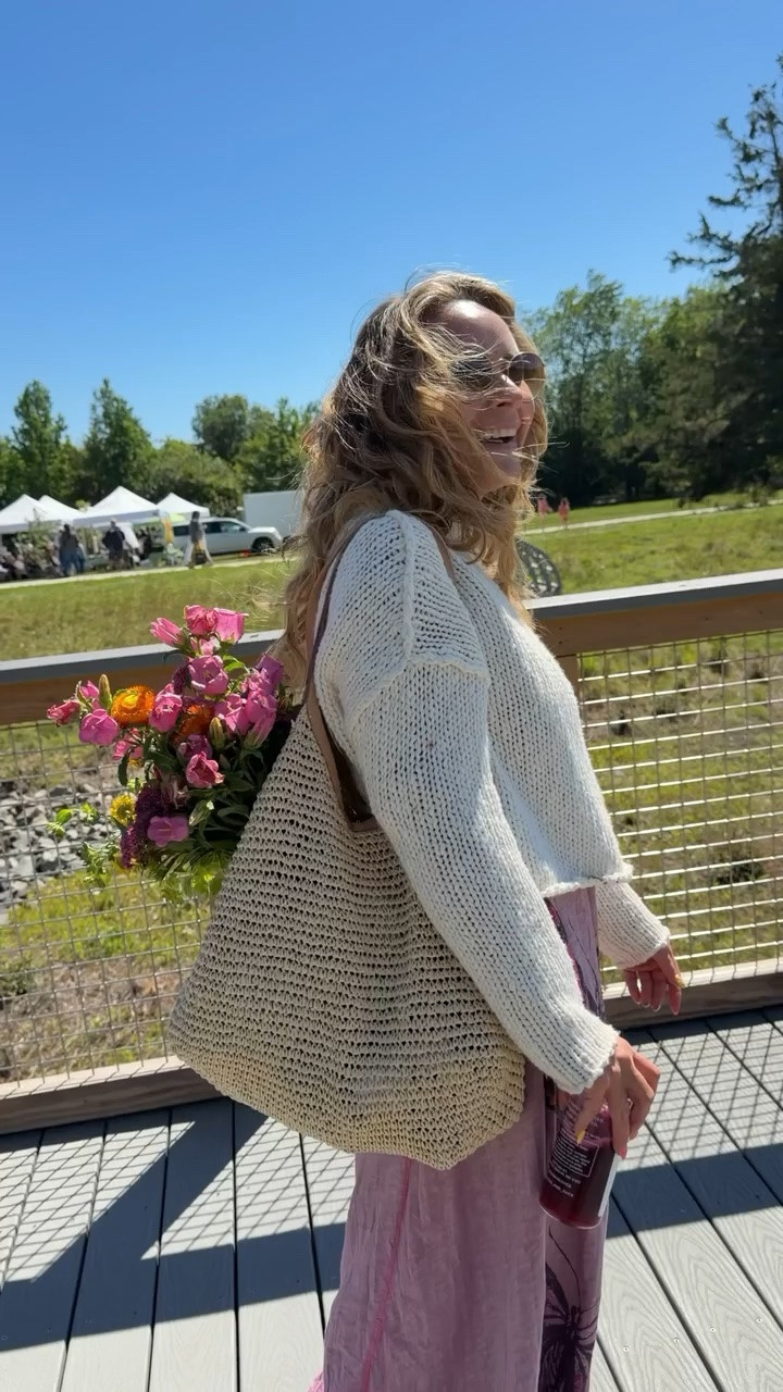 I think it would involve fresh flowers tucked under one arm, an iced coffee in hand, and a basket slowly filling with things you definitely didn't plan to buy. 🌿☕️✨  This outfit feels like wandering through rows of wildflowers, stopping for a flaky pastry, and coming home with way too much sourdough and absolutely no regrets.