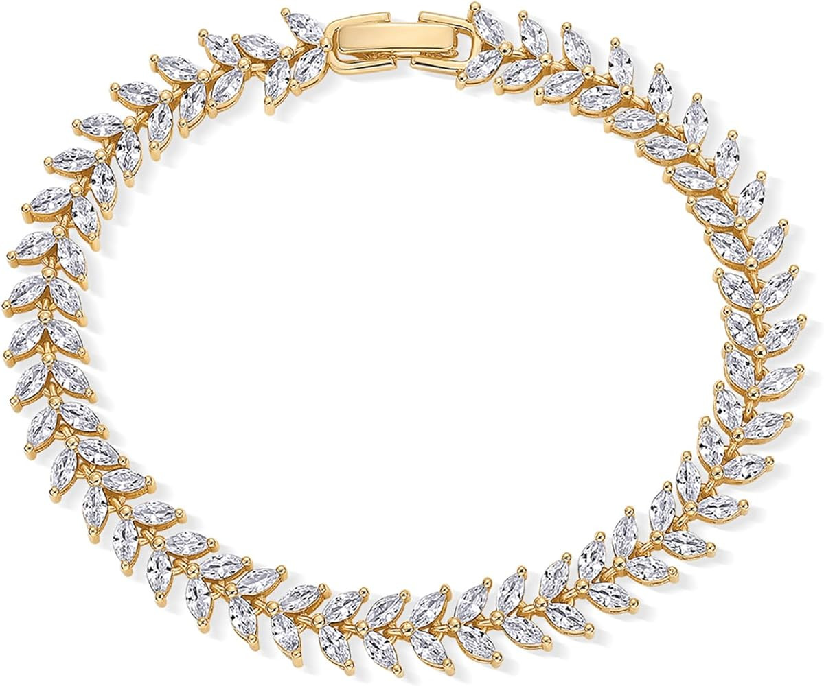 HIGHLIGHTS: Our marquise cut cubic zirconia tennis bracelet, measuring 7 inches, sparkles with de... | Amazon (US)