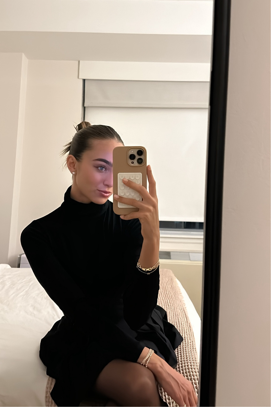 black sweater, skirt, and tights 

#LTKworkwear #LTKSeasonal