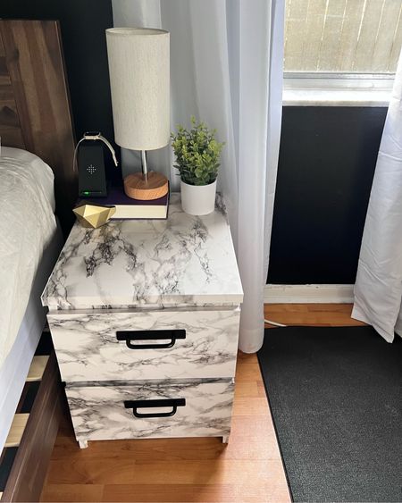Check out this marble black and white contact paper/peel and stick wallpaper find. Found on Amazon to transform my ikea furniture nightstand 
Used 197” first and finished with the 78” after
IKEA hacks
Black stick on handles
Bedside
Nightstand 

#LTKhome #LTKFind #LTKunder50